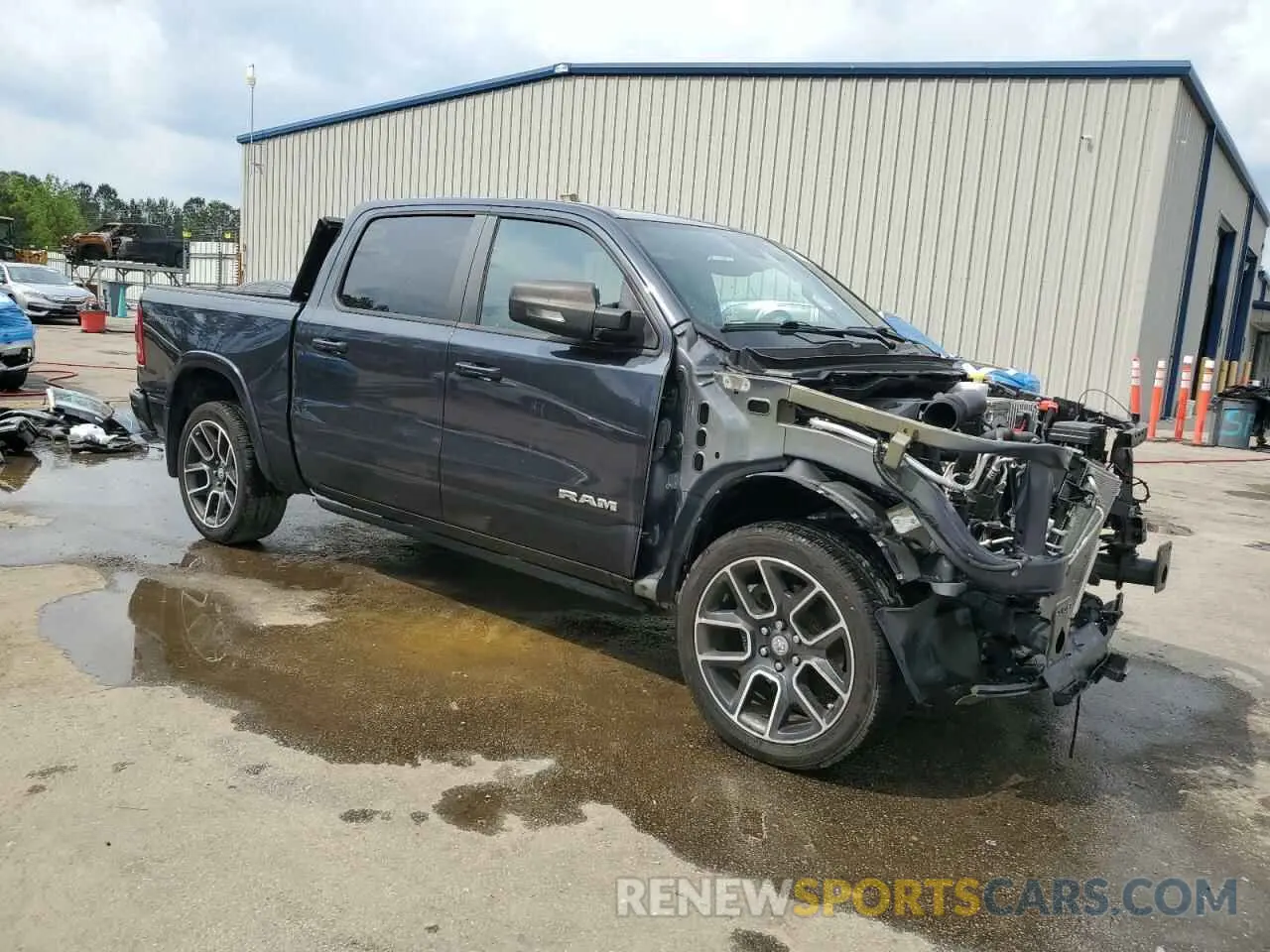 4 Photograph of a damaged car 1C6SRFJT4MN607299 RAM 1500 2021