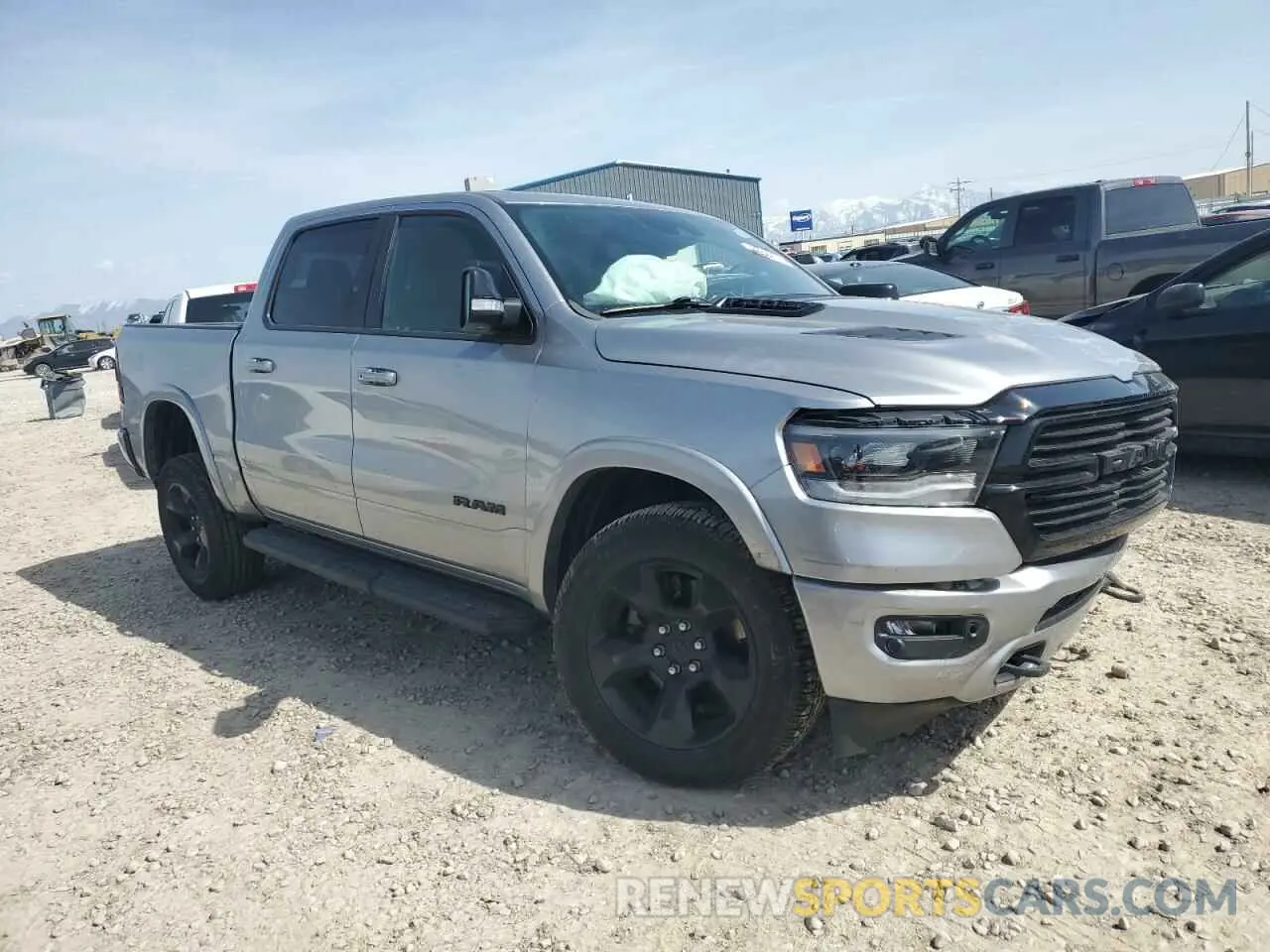 4 Photograph of a damaged car 1C6SRFJT4MN627861 RAM 1500 2021