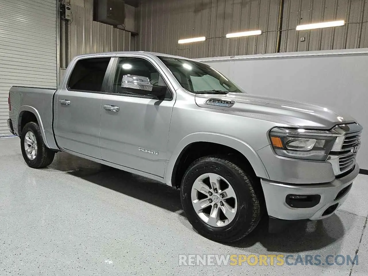 4 Photograph of a damaged car 1C6SRFJT4MN757168 RAM 1500 2021