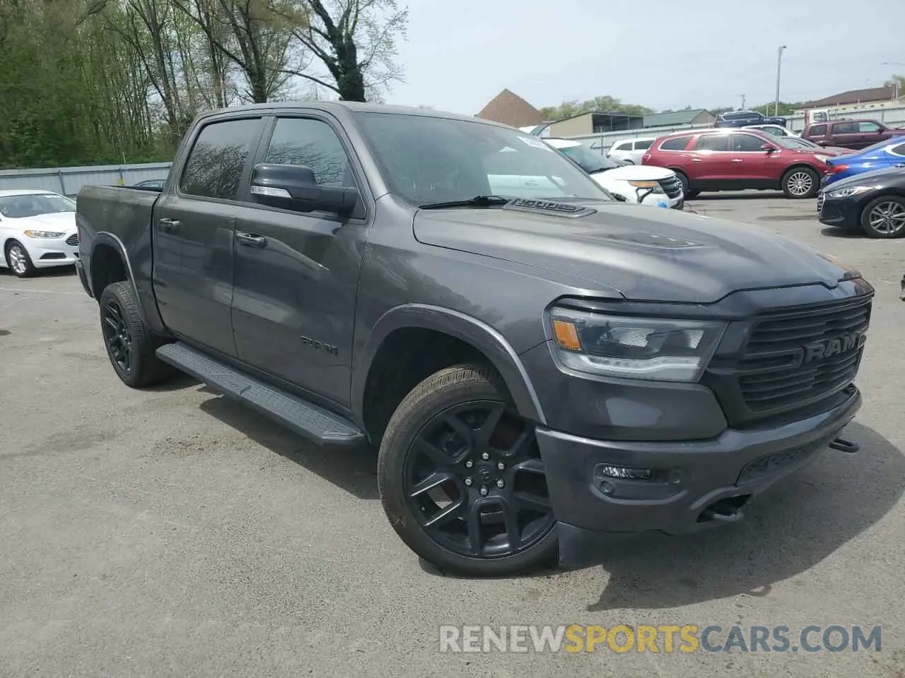4 Photograph of a damaged car 1C6SRFJT4MN764069 RAM 1500 2021