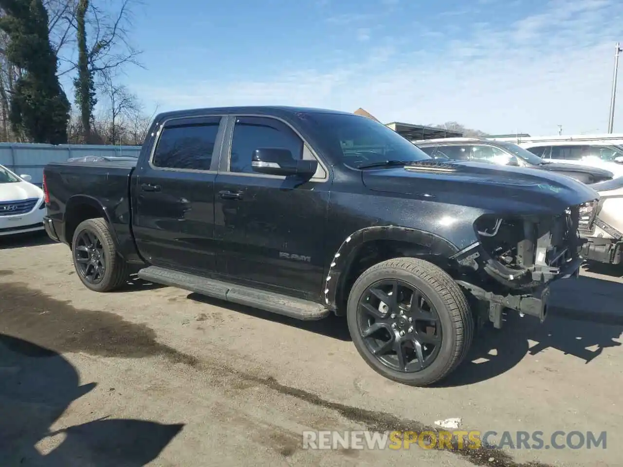 4 Photograph of a damaged car 1C6SRFJT4MN764833 RAM 1500 2021