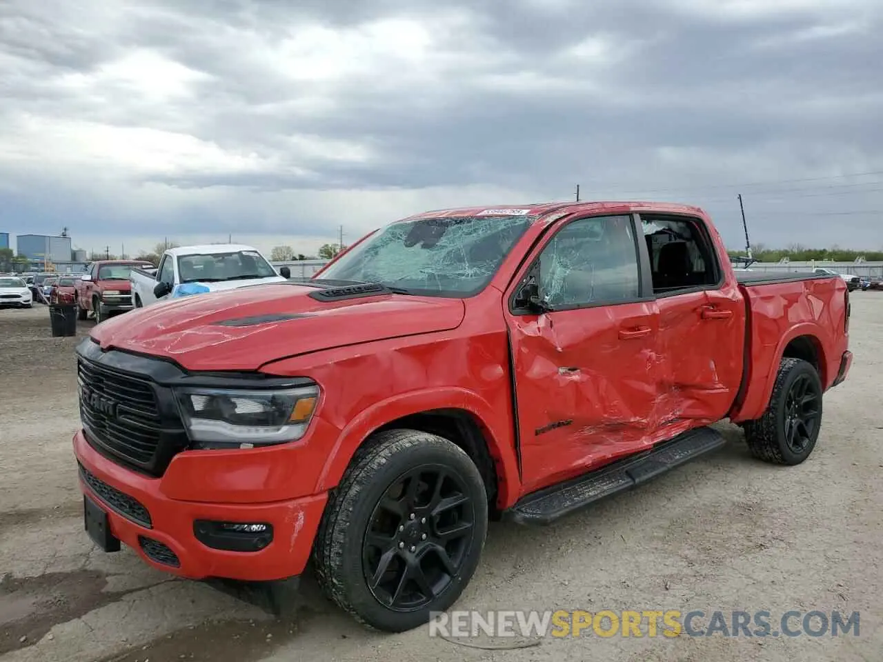 1 Photograph of a damaged car 1C6SRFJT5MN559666 RAM 1500 2021