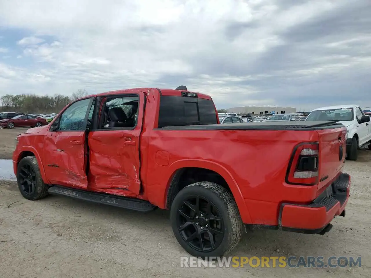 2 Photograph of a damaged car 1C6SRFJT5MN559666 RAM 1500 2021