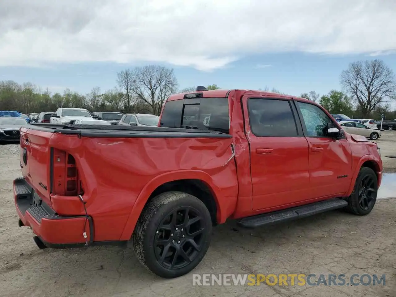 3 Photograph of a damaged car 1C6SRFJT5MN559666 RAM 1500 2021