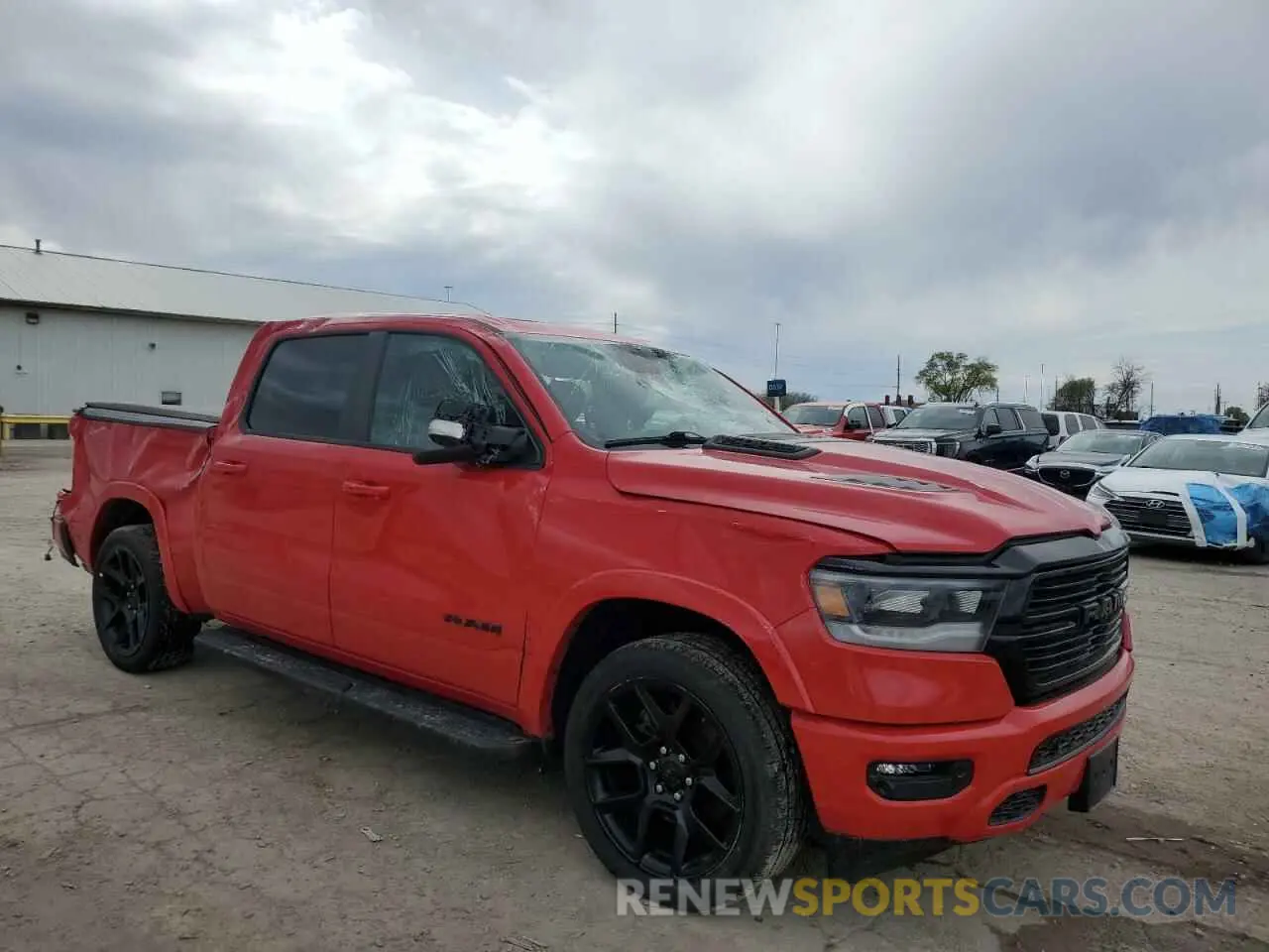 4 Photograph of a damaged car 1C6SRFJT5MN559666 RAM 1500 2021