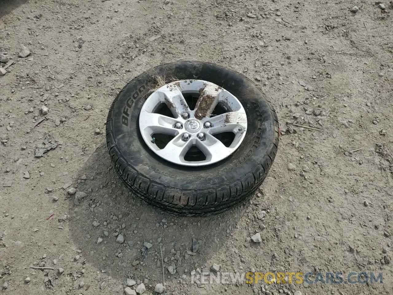 12 Photograph of a damaged car 1C6SRFJT5MN560817 RAM 1500 2021