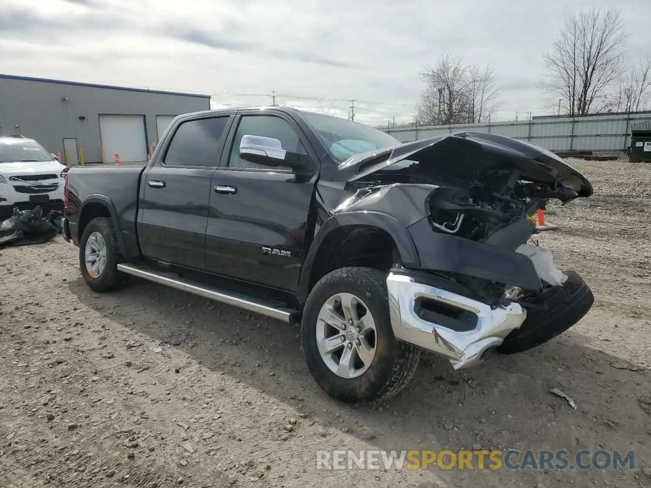 4 Photograph of a damaged car 1C6SRFJT5MN560817 RAM 1500 2021