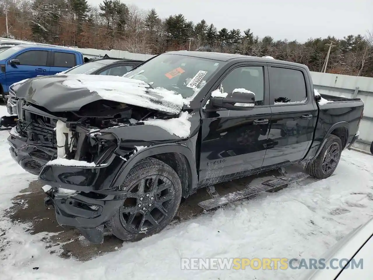 1 Photograph of a damaged car 1C6SRFJT5MN588360 RAM 1500 2021