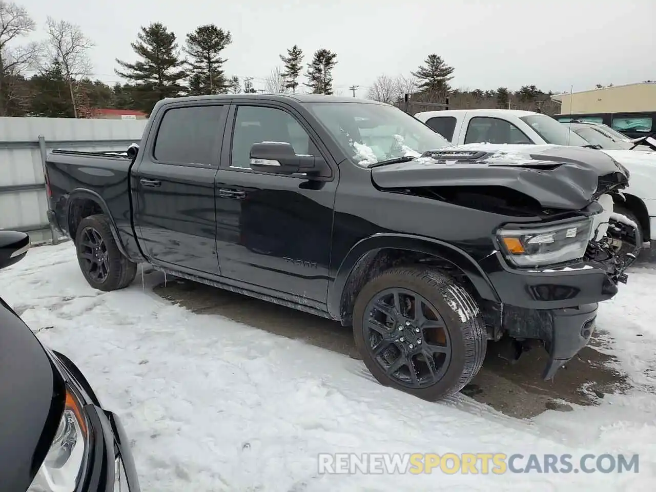 4 Photograph of a damaged car 1C6SRFJT5MN588360 RAM 1500 2021