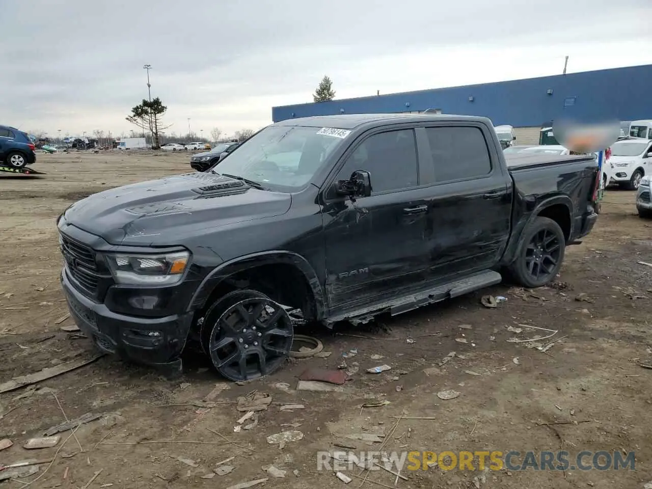 1 Photograph of a damaged car 1C6SRFJT5MN733090 RAM 1500 2021