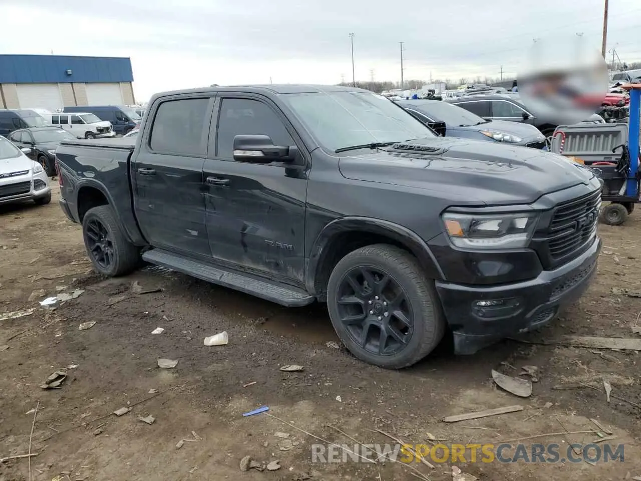 4 Photograph of a damaged car 1C6SRFJT5MN733090 RAM 1500 2021