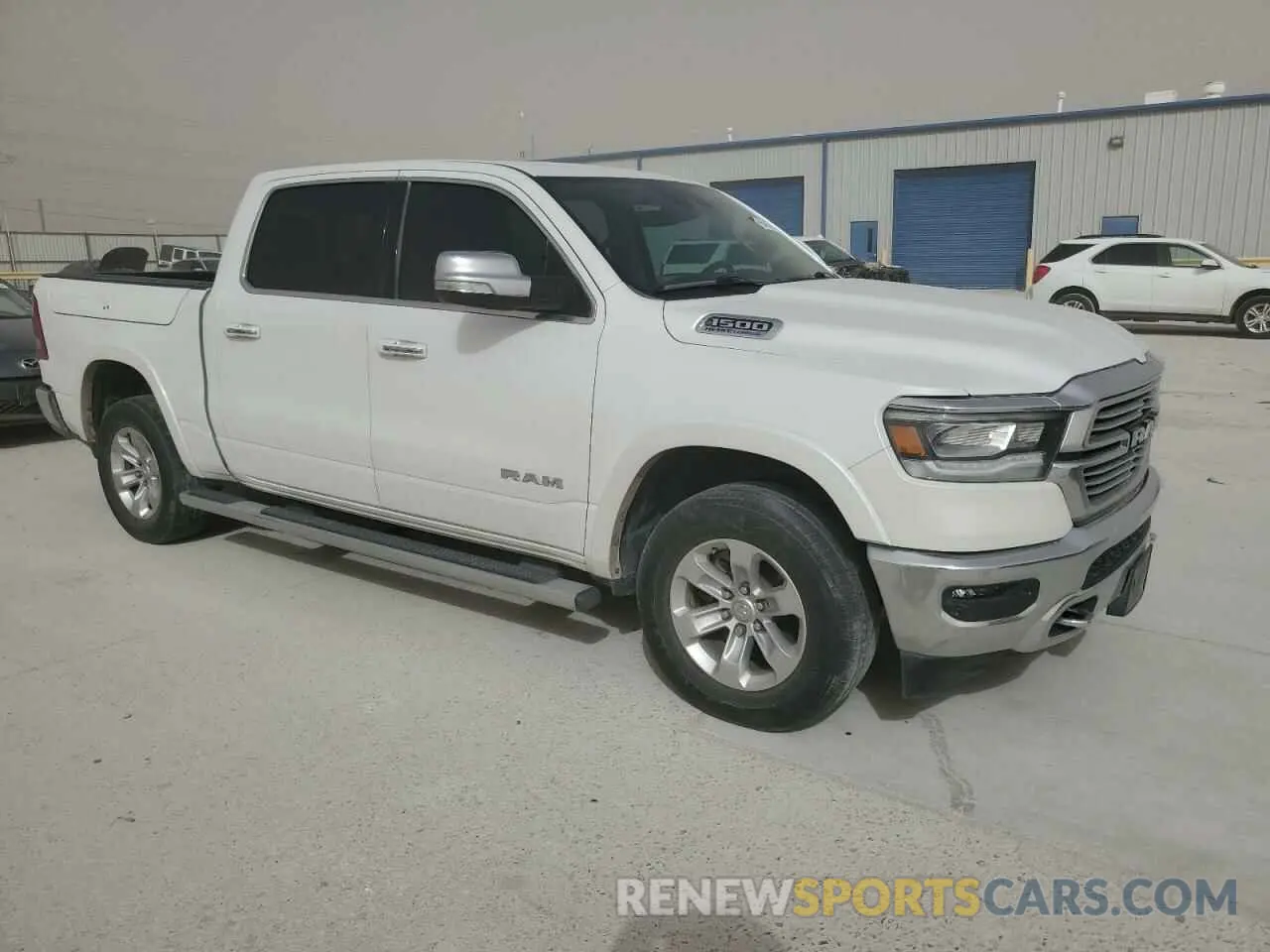 4 Photograph of a damaged car 1C6SRFJT5MN809584 RAM 1500 2021