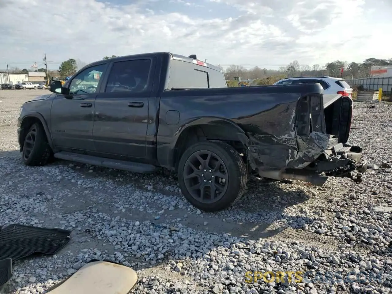 2 Photograph of a damaged car 1C6SRFJT6MN524599 RAM 1500 2021