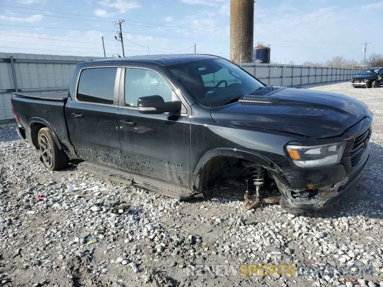 4 Photograph of a damaged car 1C6SRFJT6MN524599 RAM 1500 2021