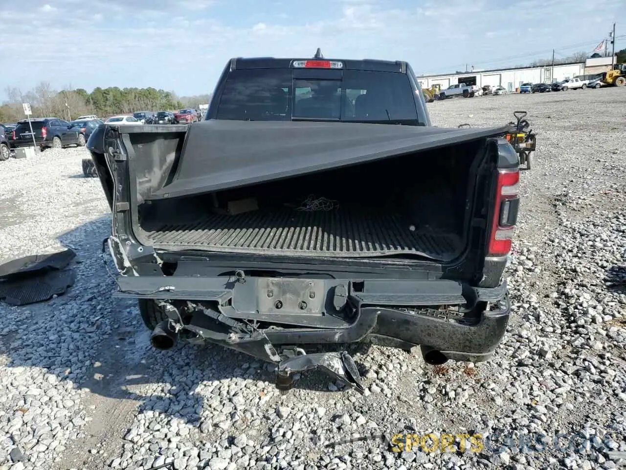 6 Photograph of a damaged car 1C6SRFJT6MN524599 RAM 1500 2021