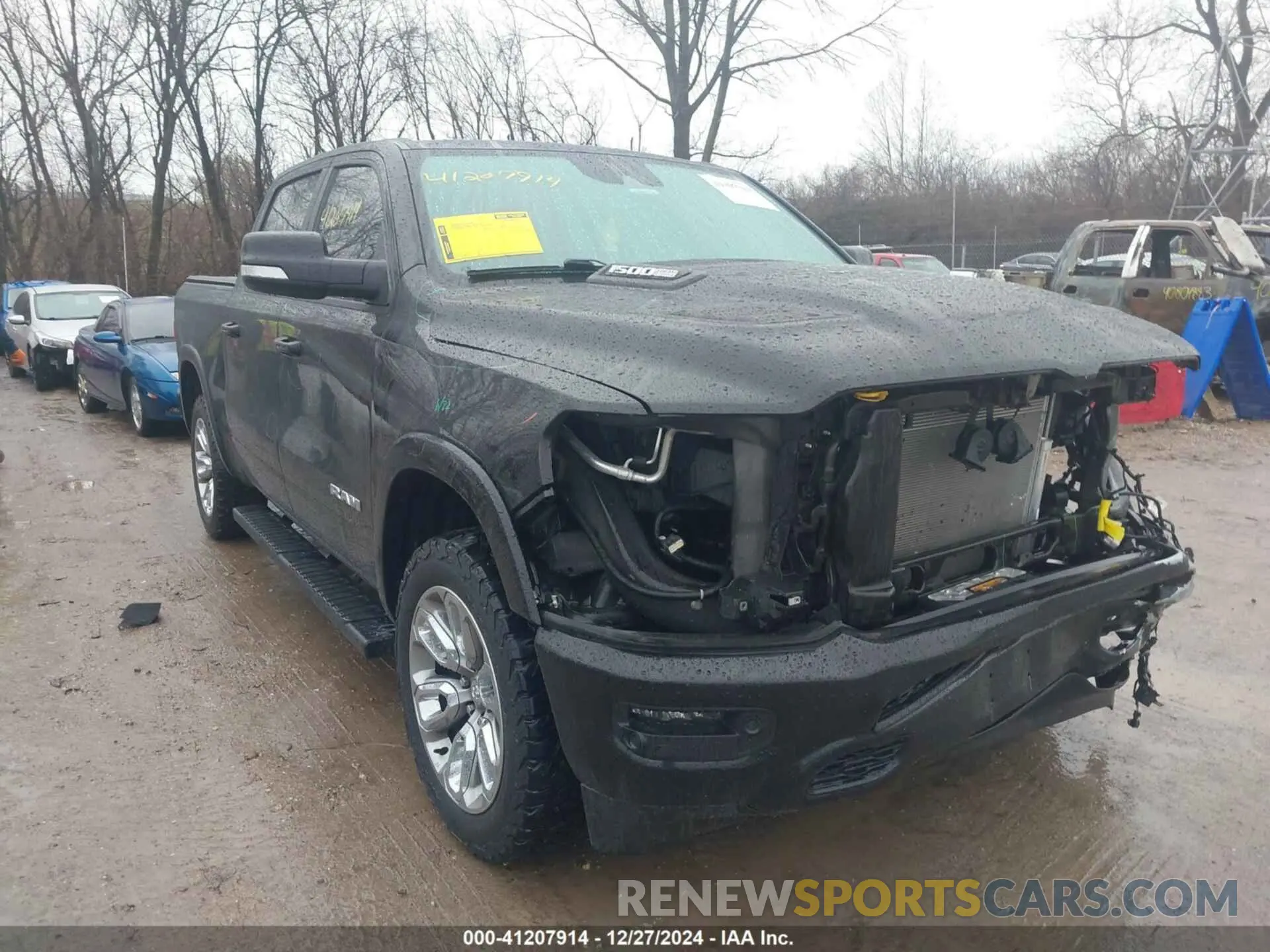 1 Photograph of a damaged car 1C6SRFJT6MN580803 RAM 1500 2021
