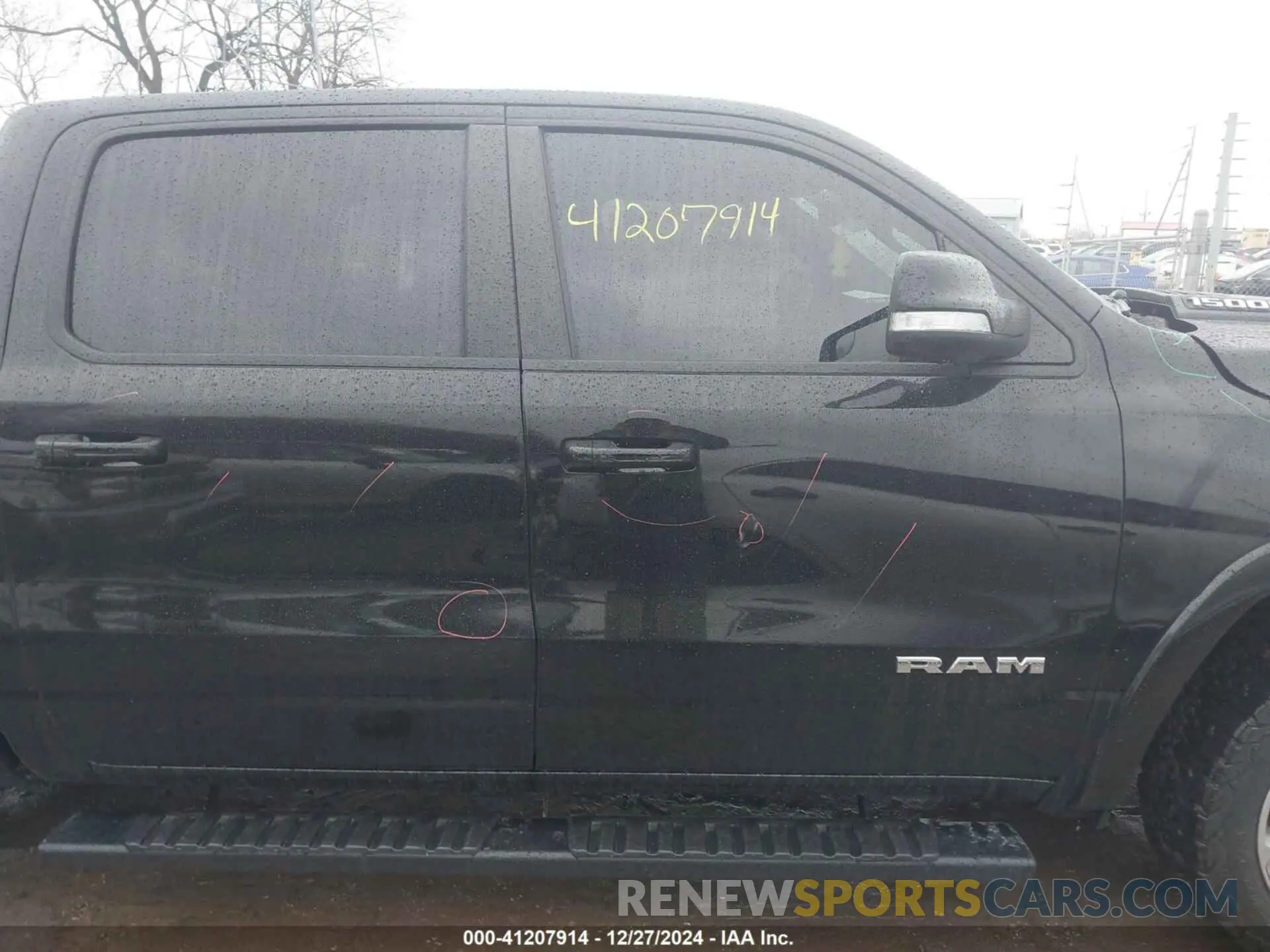 14 Photograph of a damaged car 1C6SRFJT6MN580803 RAM 1500 2021