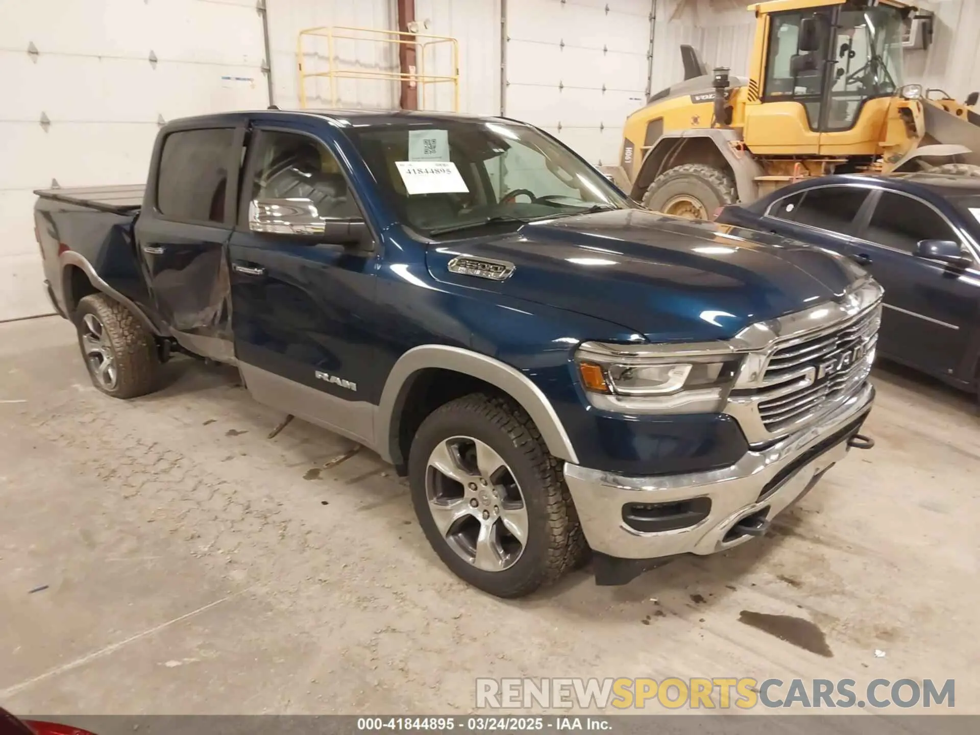 1 Photograph of a damaged car 1C6SRFJT6MN659212 RAM 1500 2021