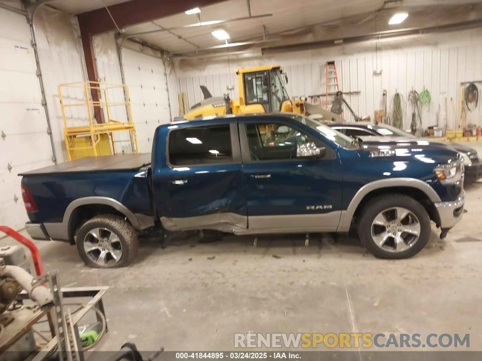 13 Photograph of a damaged car 1C6SRFJT6MN659212 RAM 1500 2021