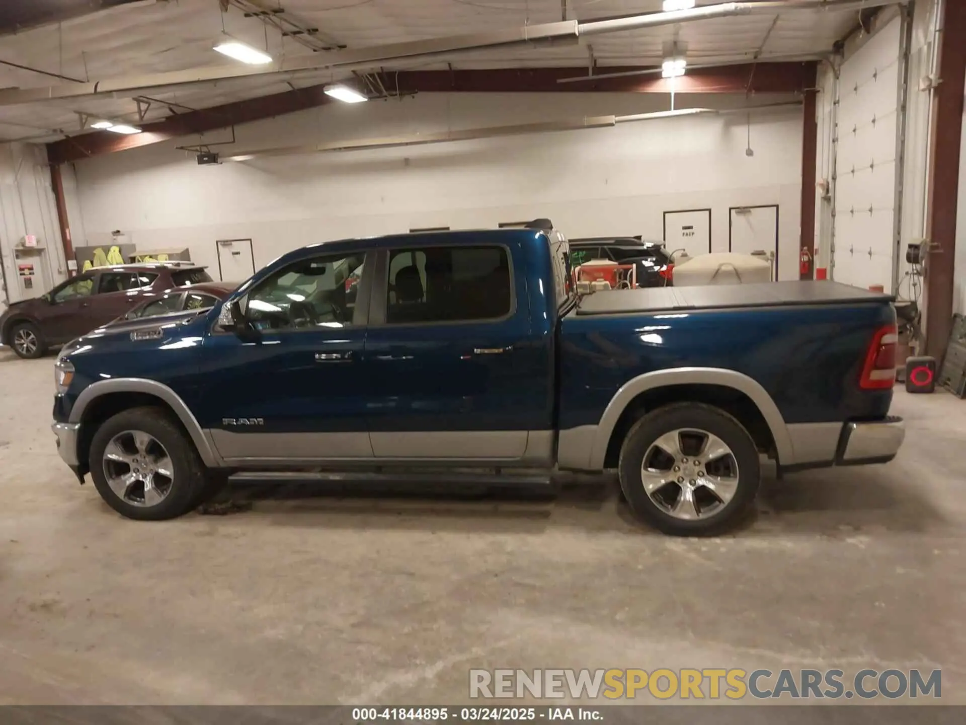 14 Photograph of a damaged car 1C6SRFJT6MN659212 RAM 1500 2021