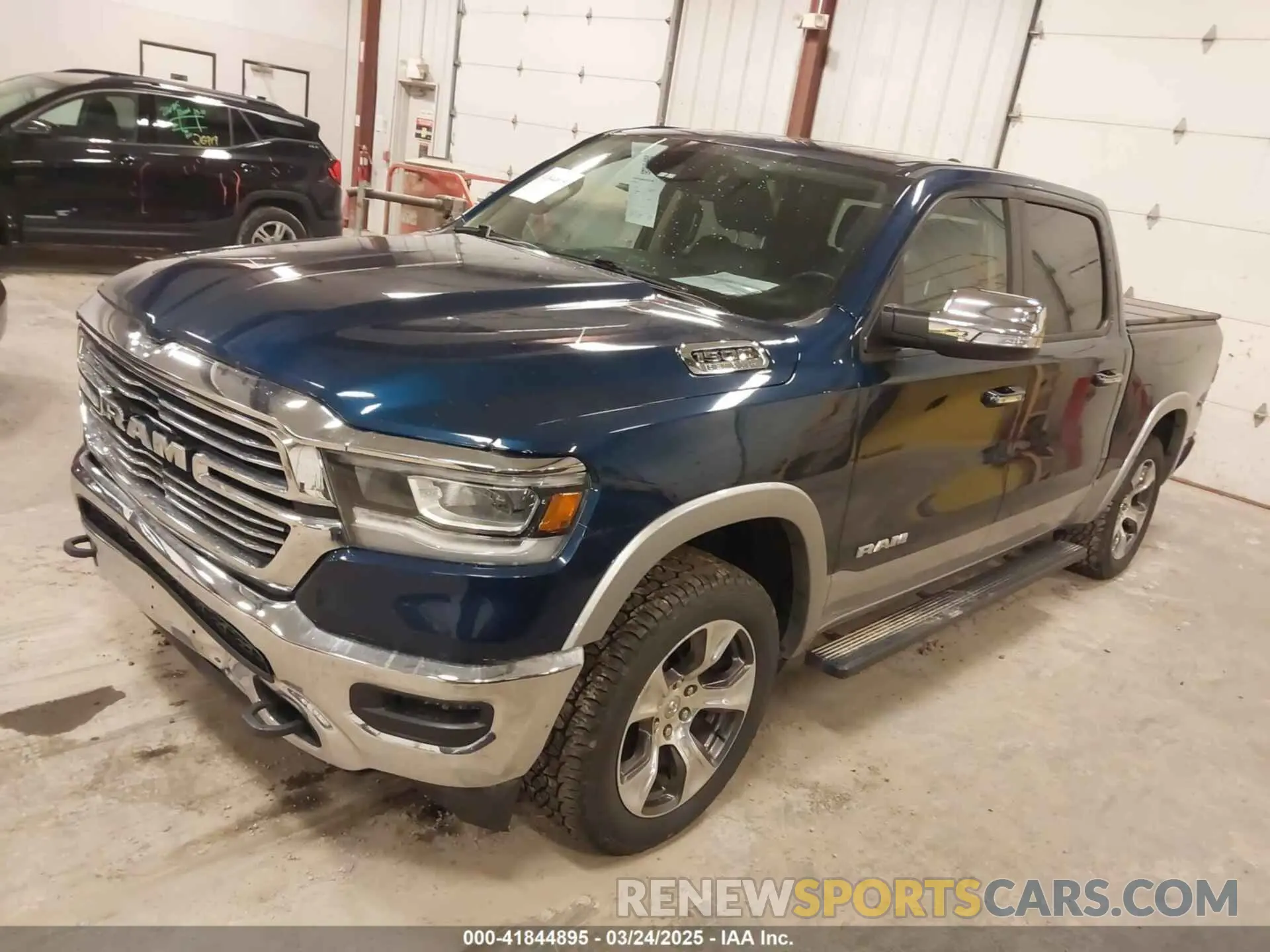 2 Photograph of a damaged car 1C6SRFJT6MN659212 RAM 1500 2021