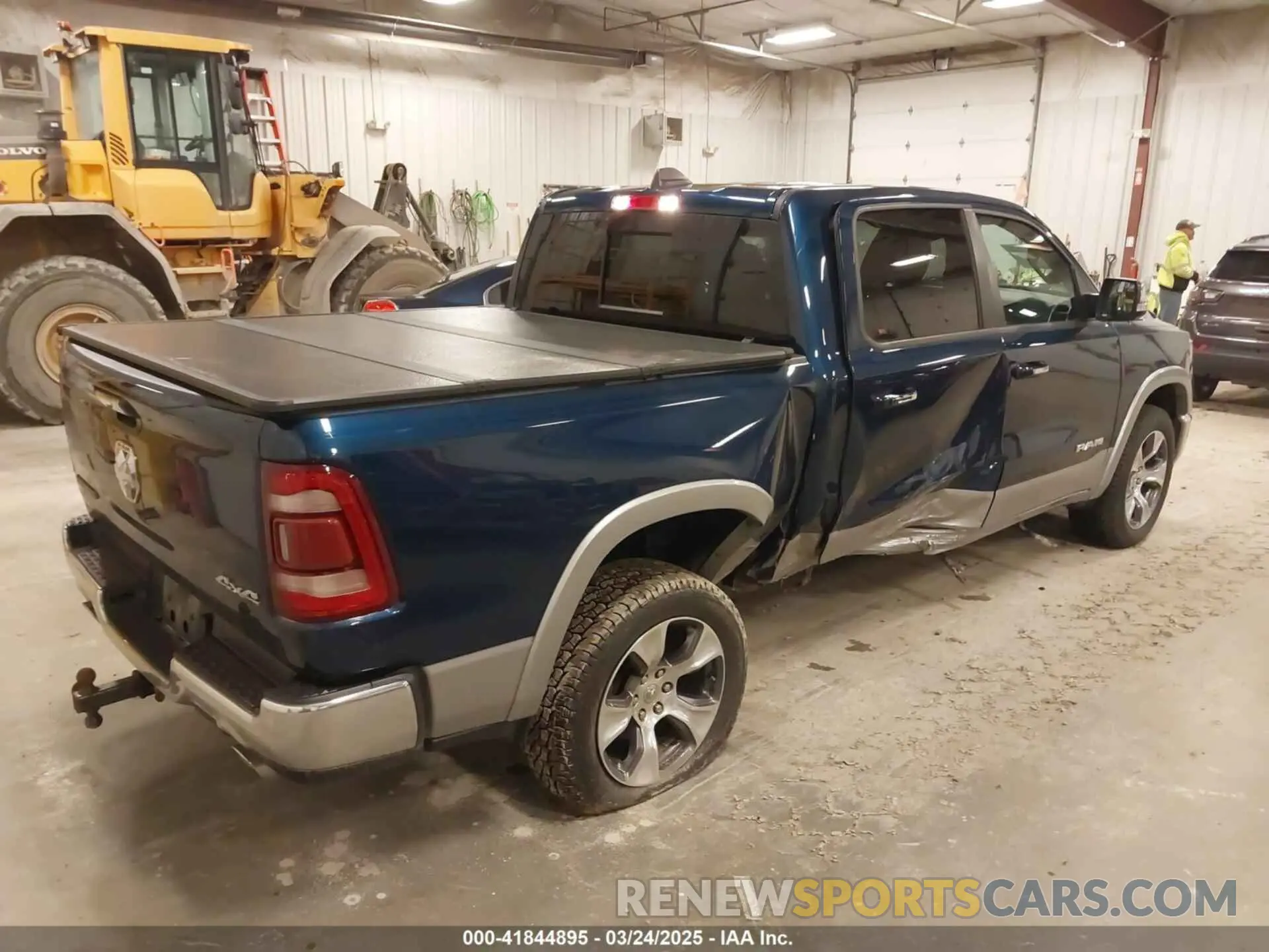 4 Photograph of a damaged car 1C6SRFJT6MN659212 RAM 1500 2021