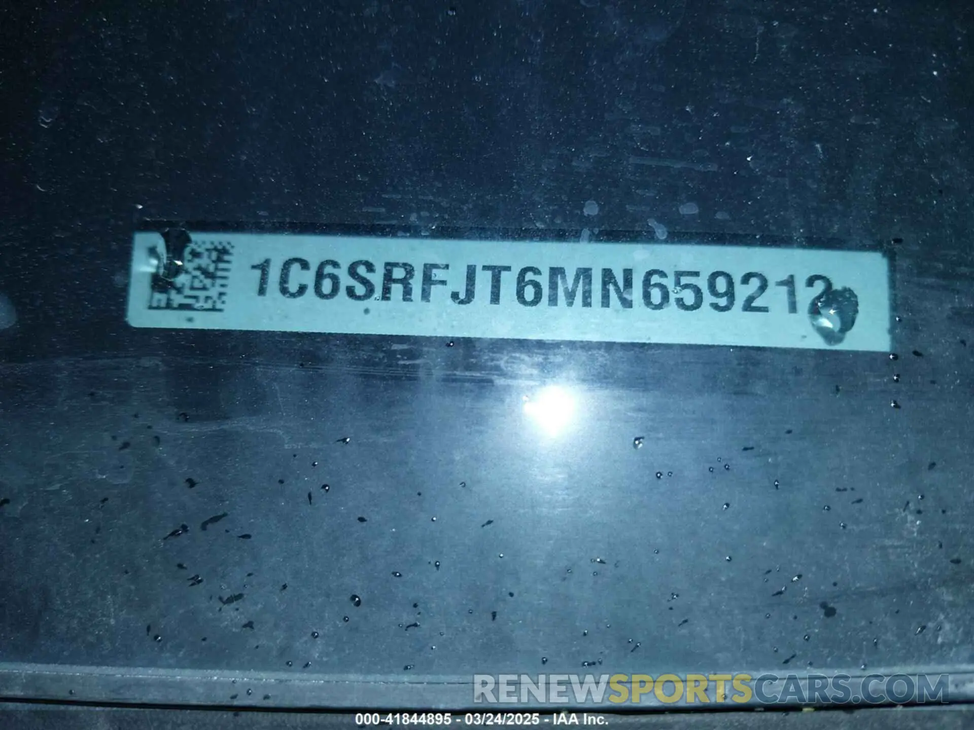 9 Photograph of a damaged car 1C6SRFJT6MN659212 RAM 1500 2021