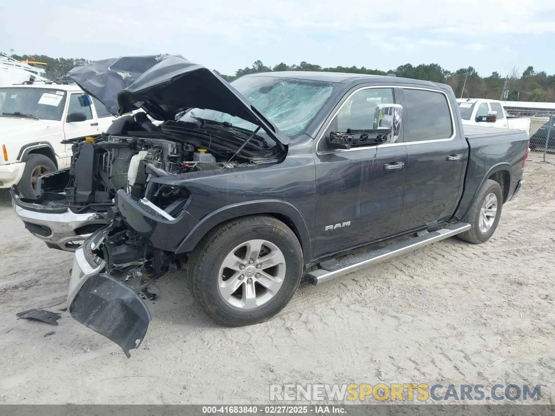 2 Photograph of a damaged car 1C6SRFJT6MN666399 RAM 1500 2021