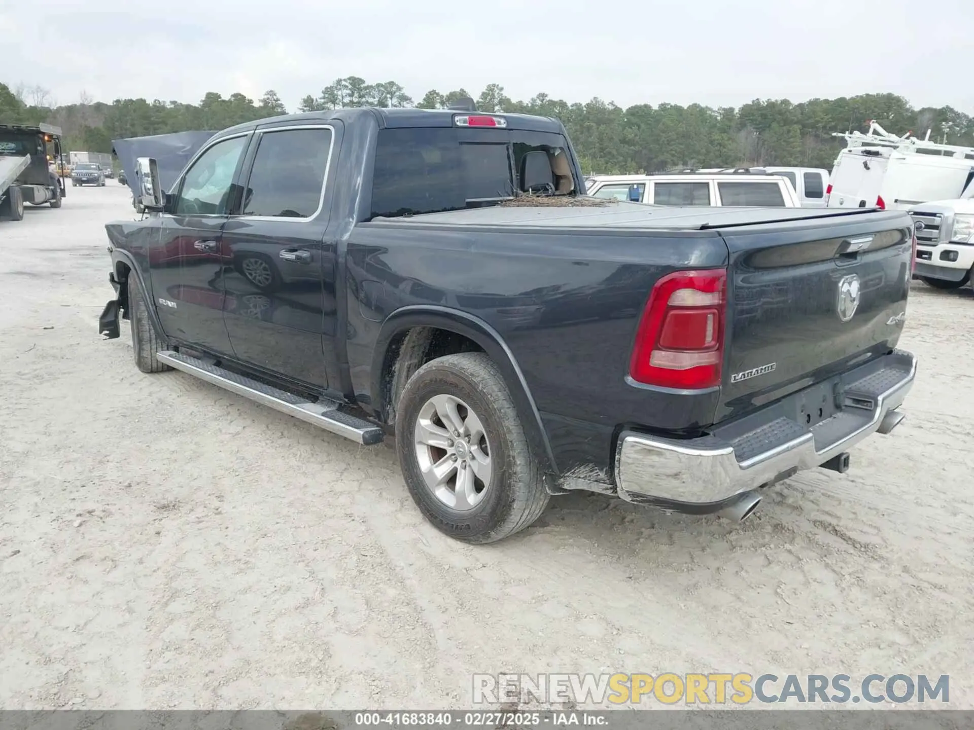 3 Photograph of a damaged car 1C6SRFJT6MN666399 RAM 1500 2021