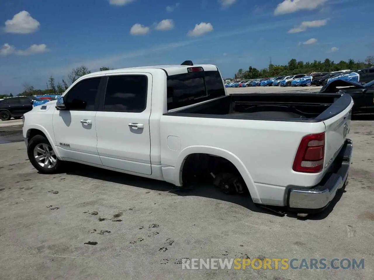 2 Photograph of a damaged car 1C6SRFJT6MN671165 RAM 1500 2021
