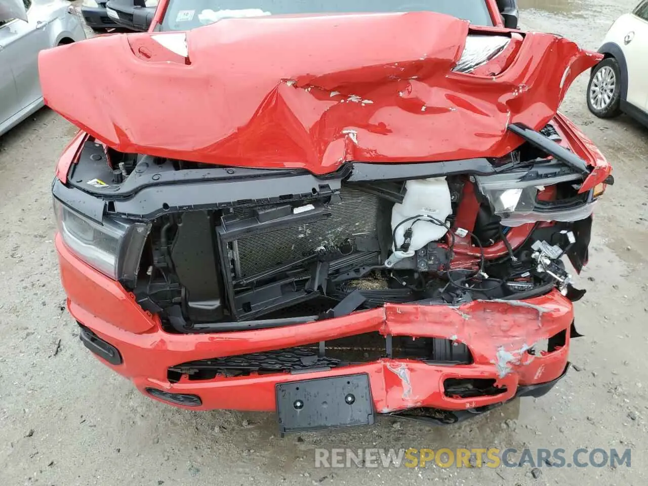 11 Photograph of a damaged car 1C6SRFJT6MN704181 RAM 1500 2021