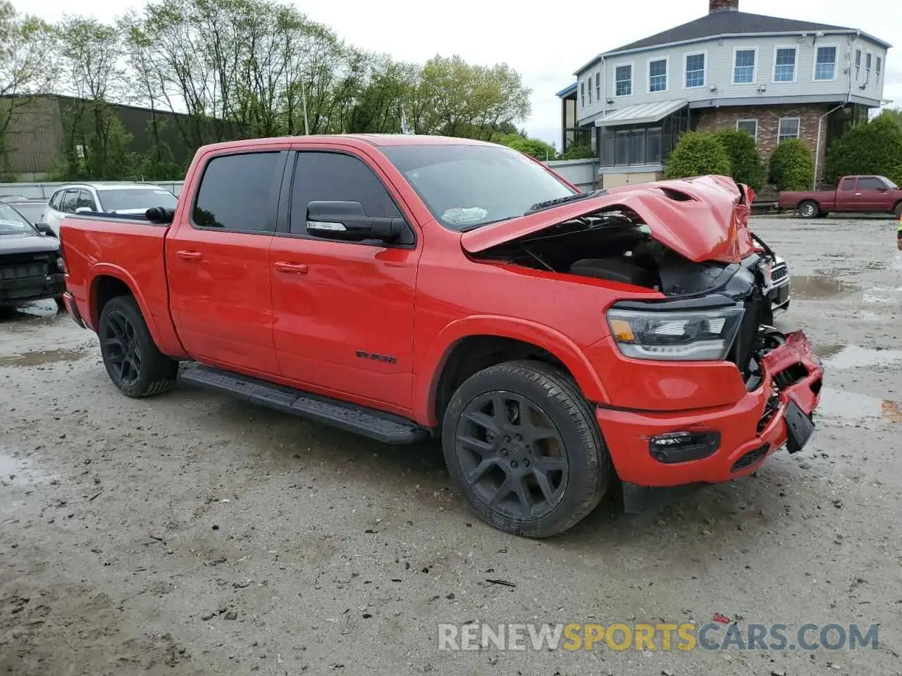 4 Photograph of a damaged car 1C6SRFJT6MN704181 RAM 1500 2021