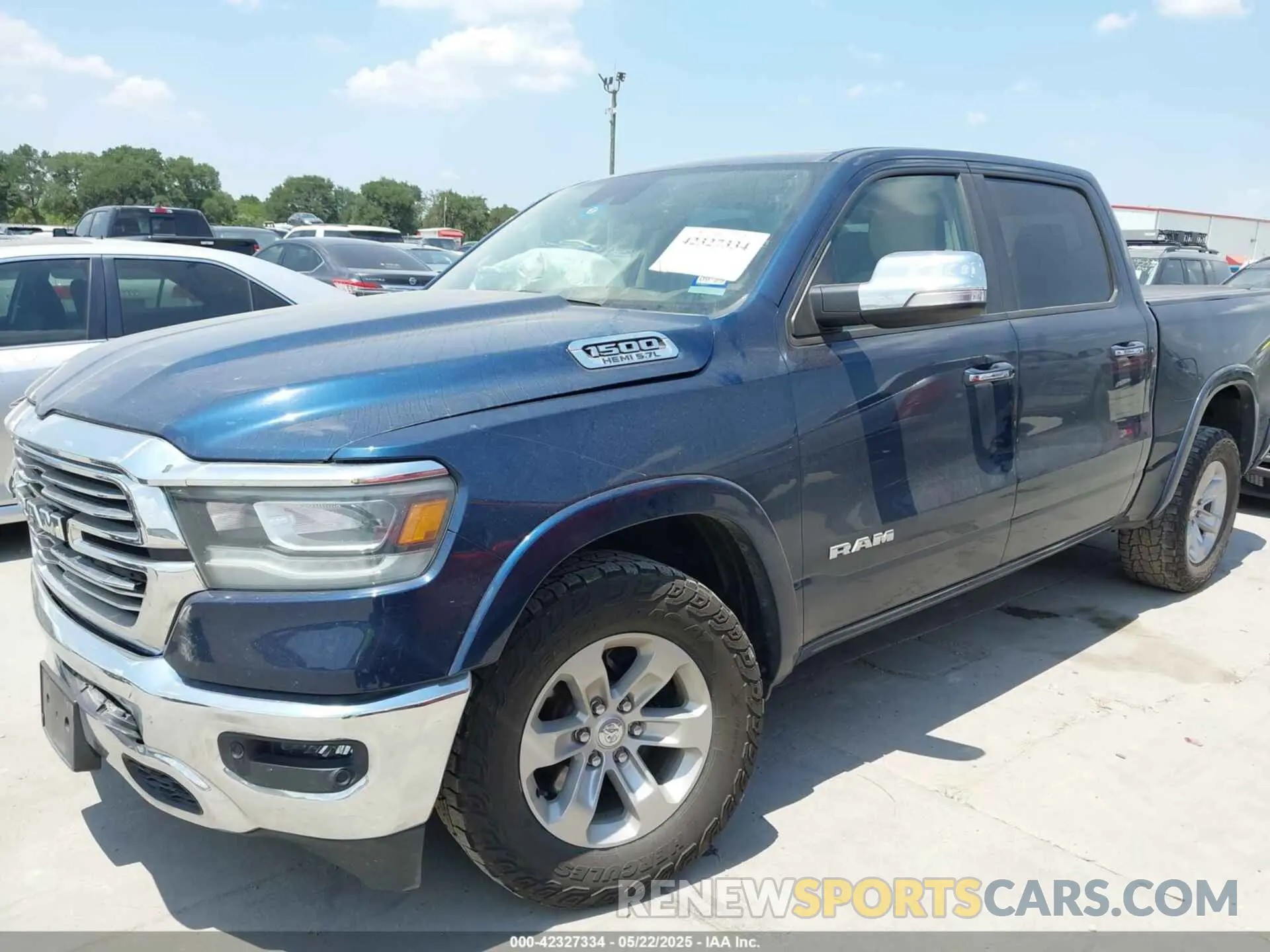 2 Photograph of a damaged car 1C6SRFJT6MN821694 RAM 1500 2021