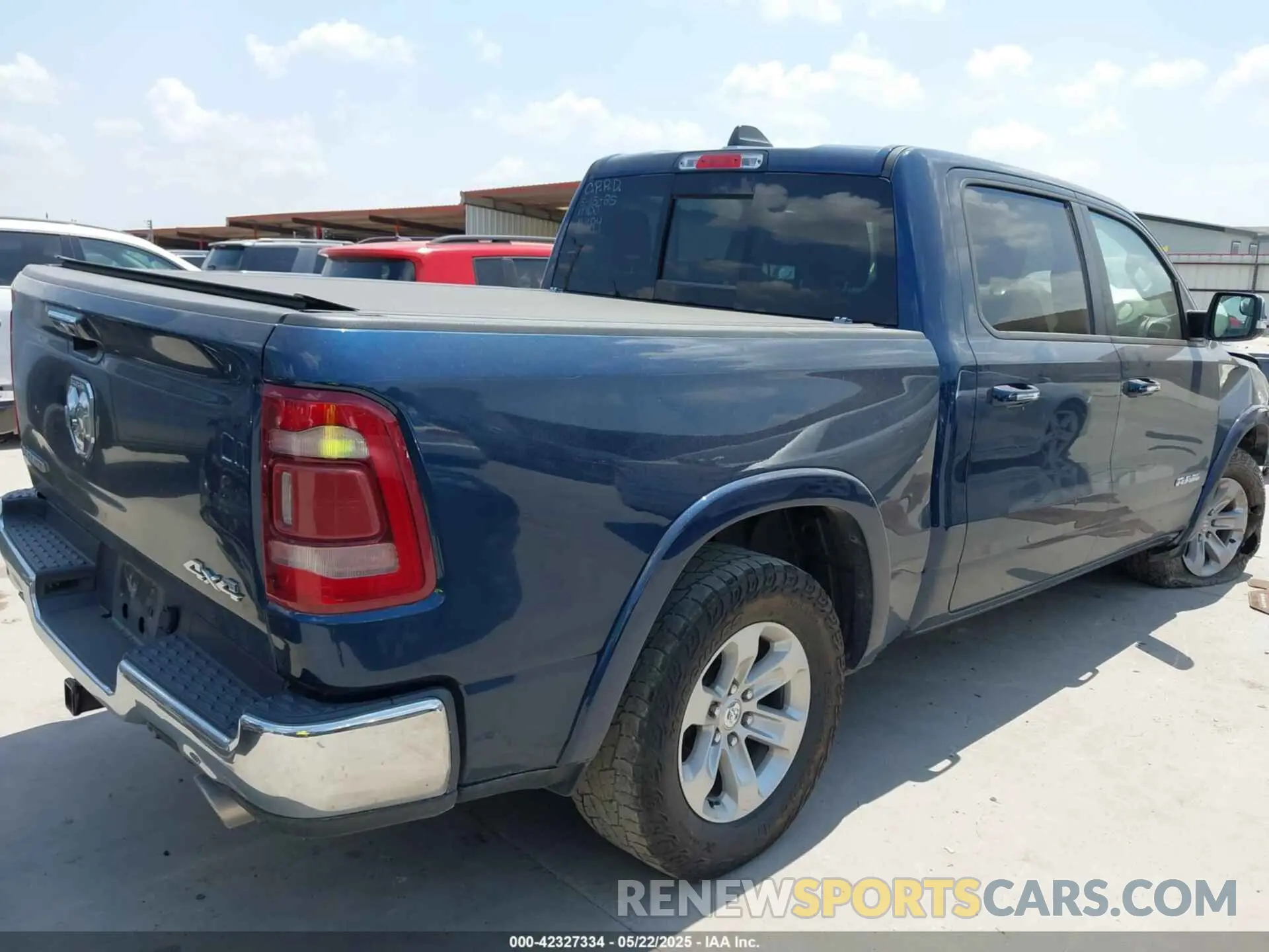 4 Photograph of a damaged car 1C6SRFJT6MN821694 RAM 1500 2021