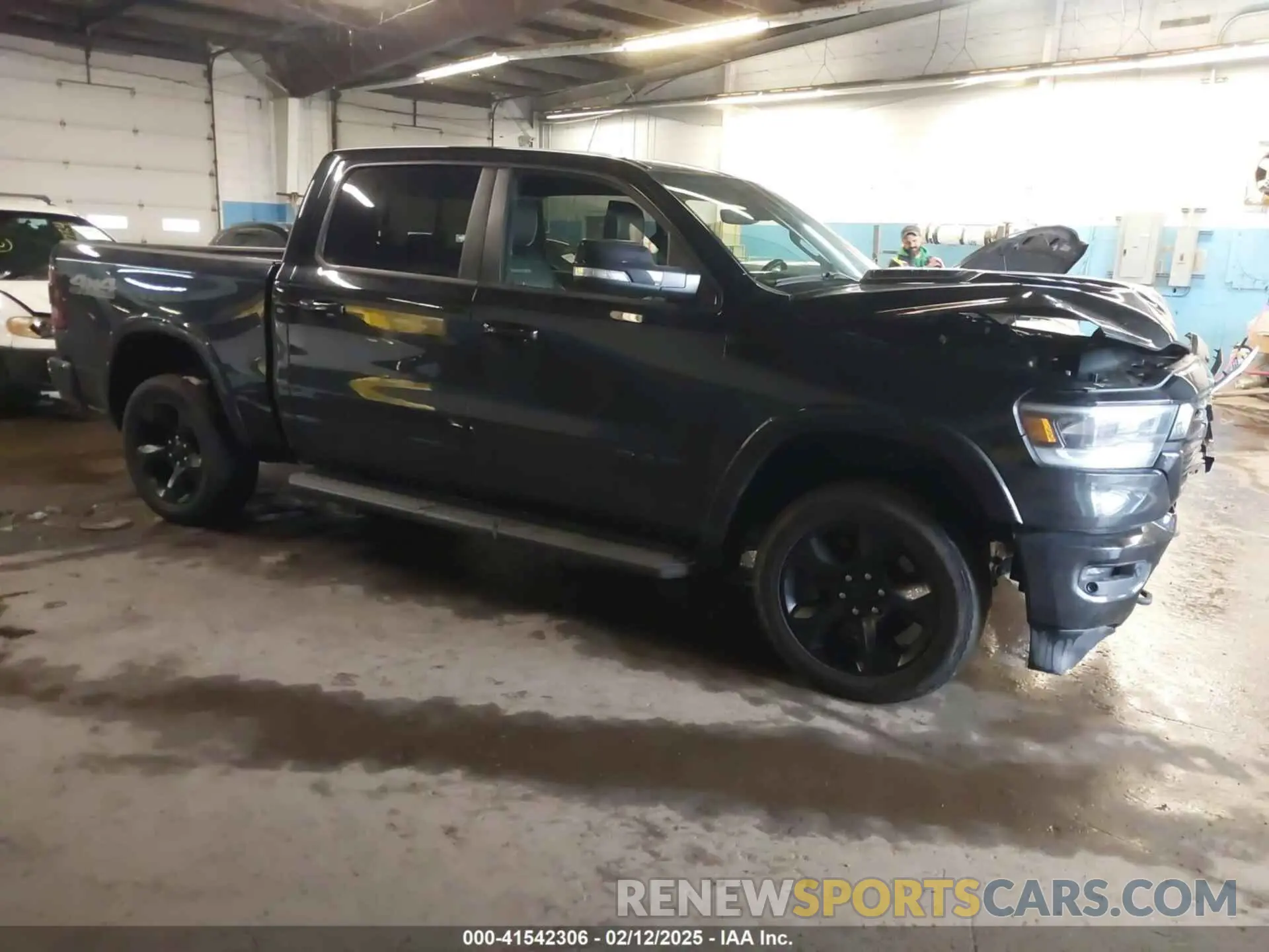 1 Photograph of a damaged car 1C6SRFJT8MN515628 RAM 1500 2021