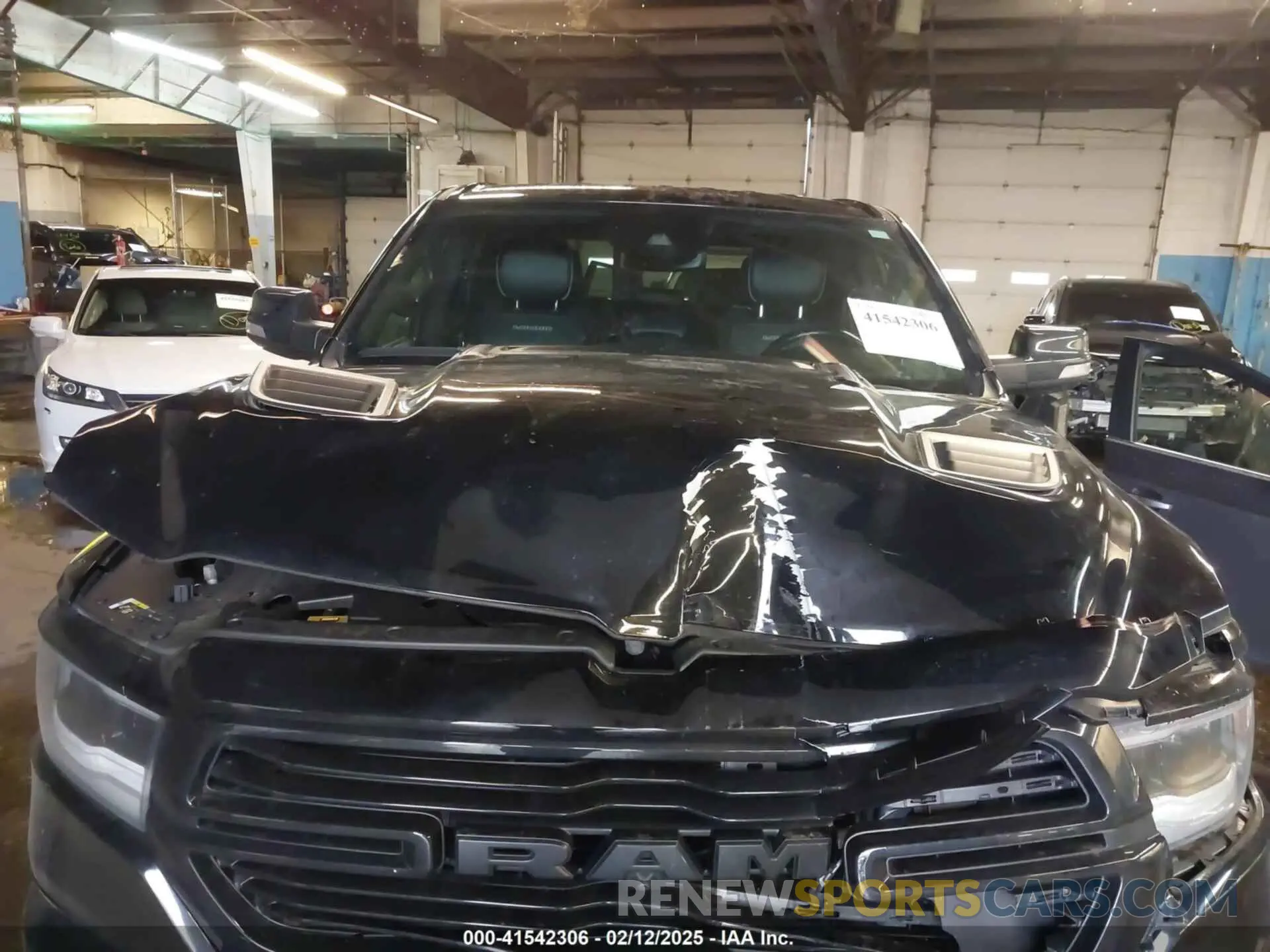 10 Photograph of a damaged car 1C6SRFJT8MN515628 RAM 1500 2021