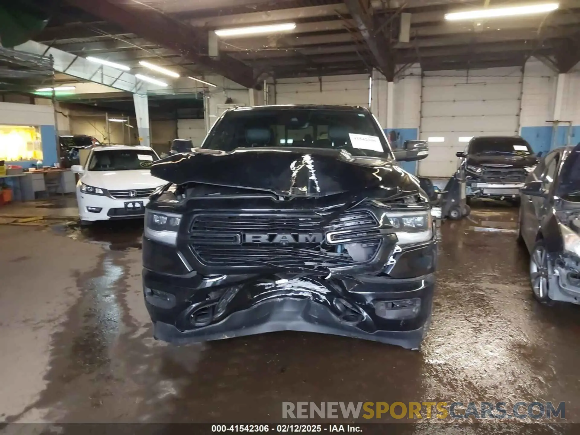 12 Photograph of a damaged car 1C6SRFJT8MN515628 RAM 1500 2021