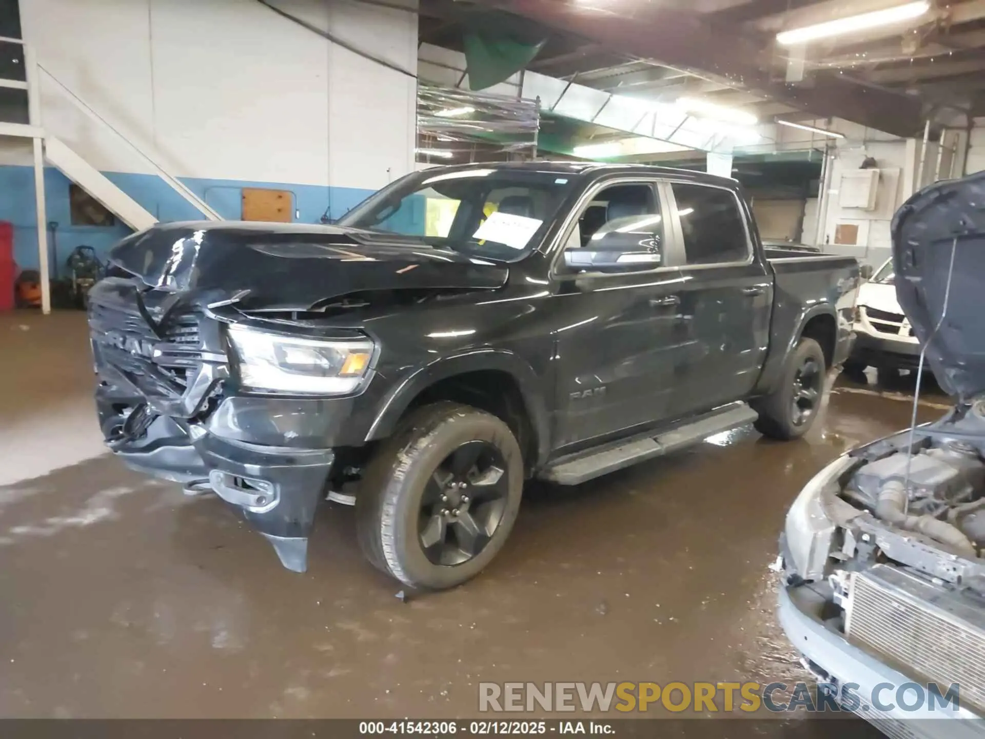 14 Photograph of a damaged car 1C6SRFJT8MN515628 RAM 1500 2021