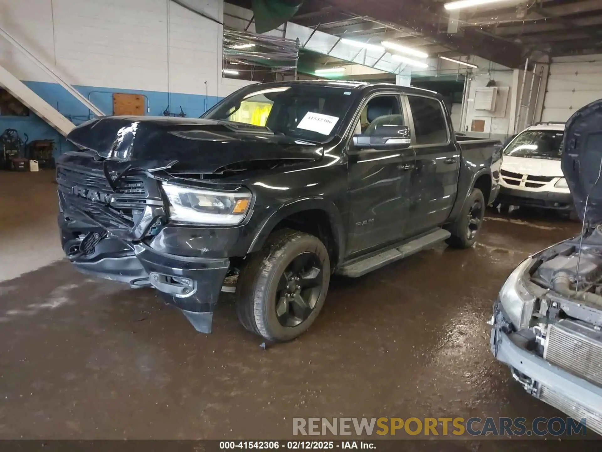 2 Photograph of a damaged car 1C6SRFJT8MN515628 RAM 1500 2021