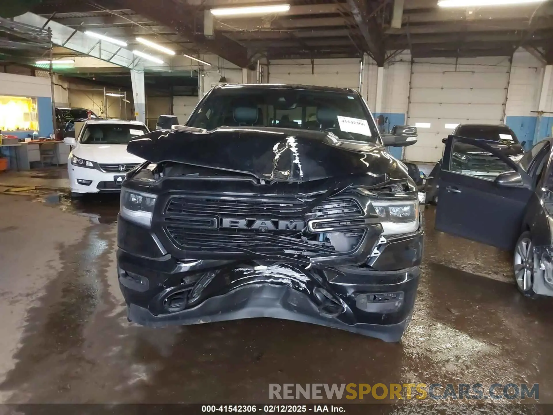 6 Photograph of a damaged car 1C6SRFJT8MN515628 RAM 1500 2021