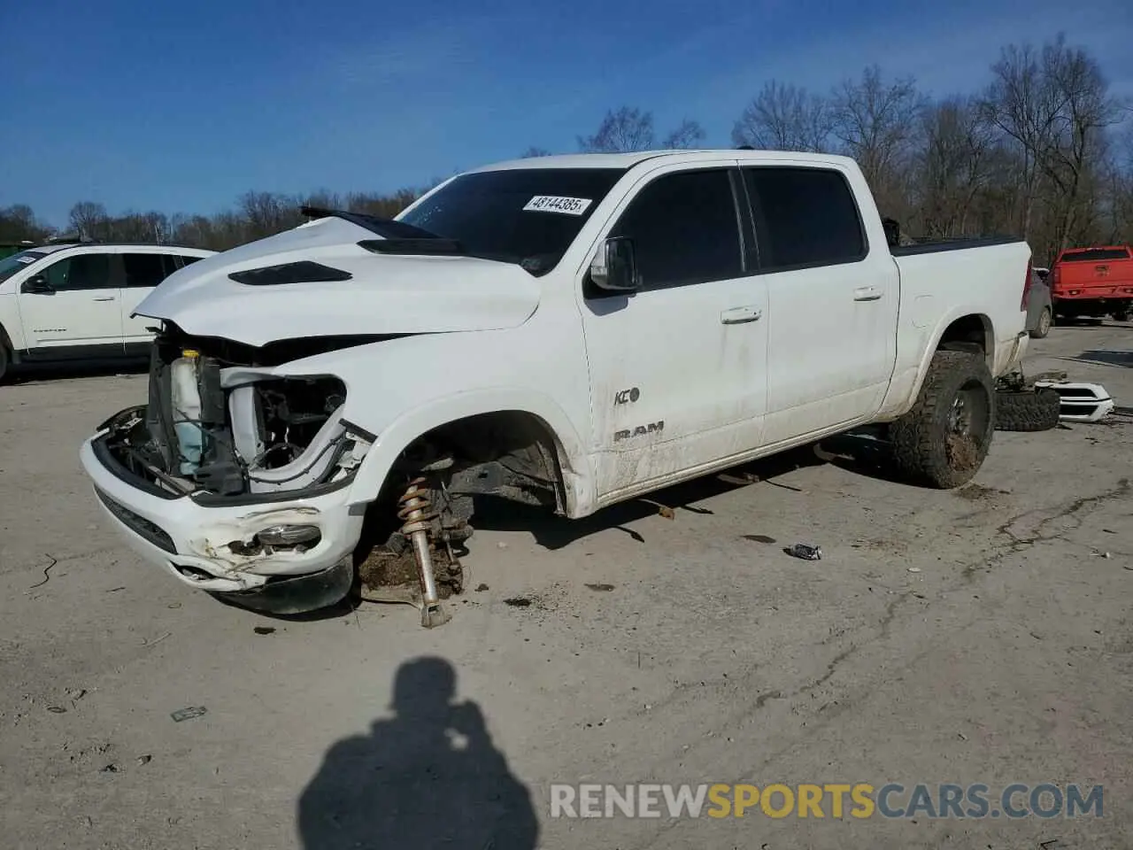 1 Photograph of a damaged car 1C6SRFJT8MN516777 RAM 1500 2021