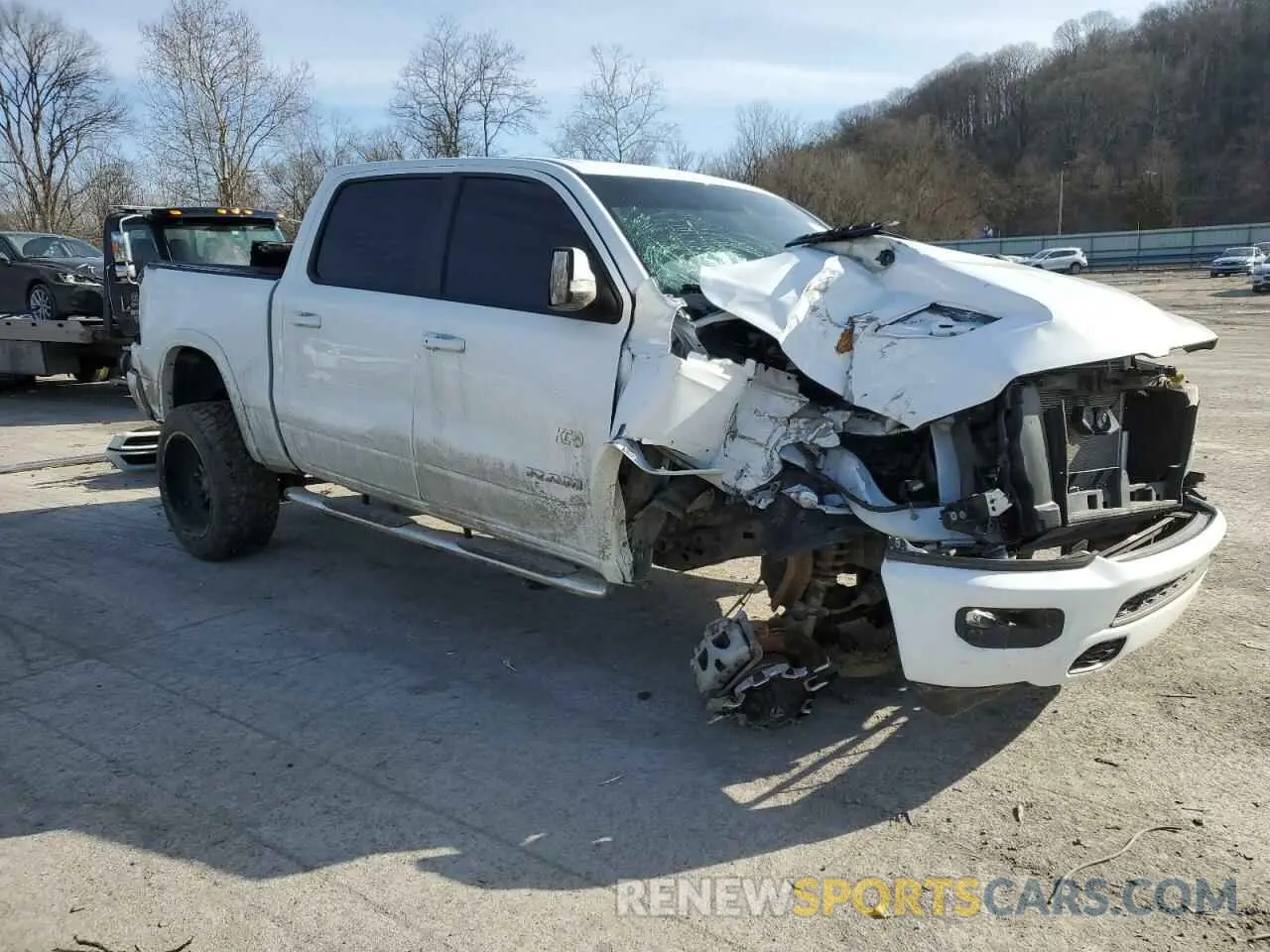 4 Photograph of a damaged car 1C6SRFJT8MN516777 RAM 1500 2021