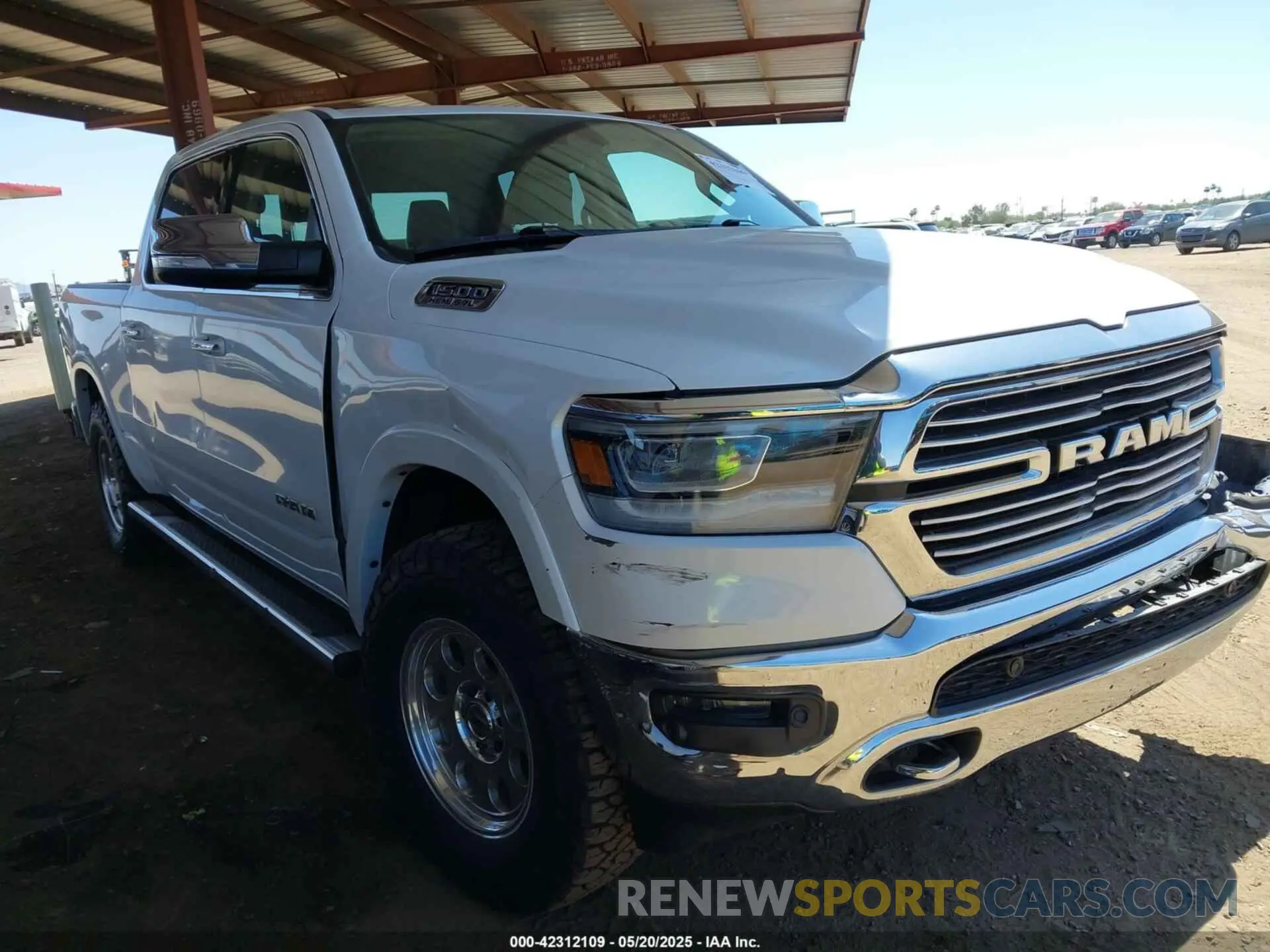 1 Photograph of a damaged car 1C6SRFJT8MN524720 RAM 1500 2021