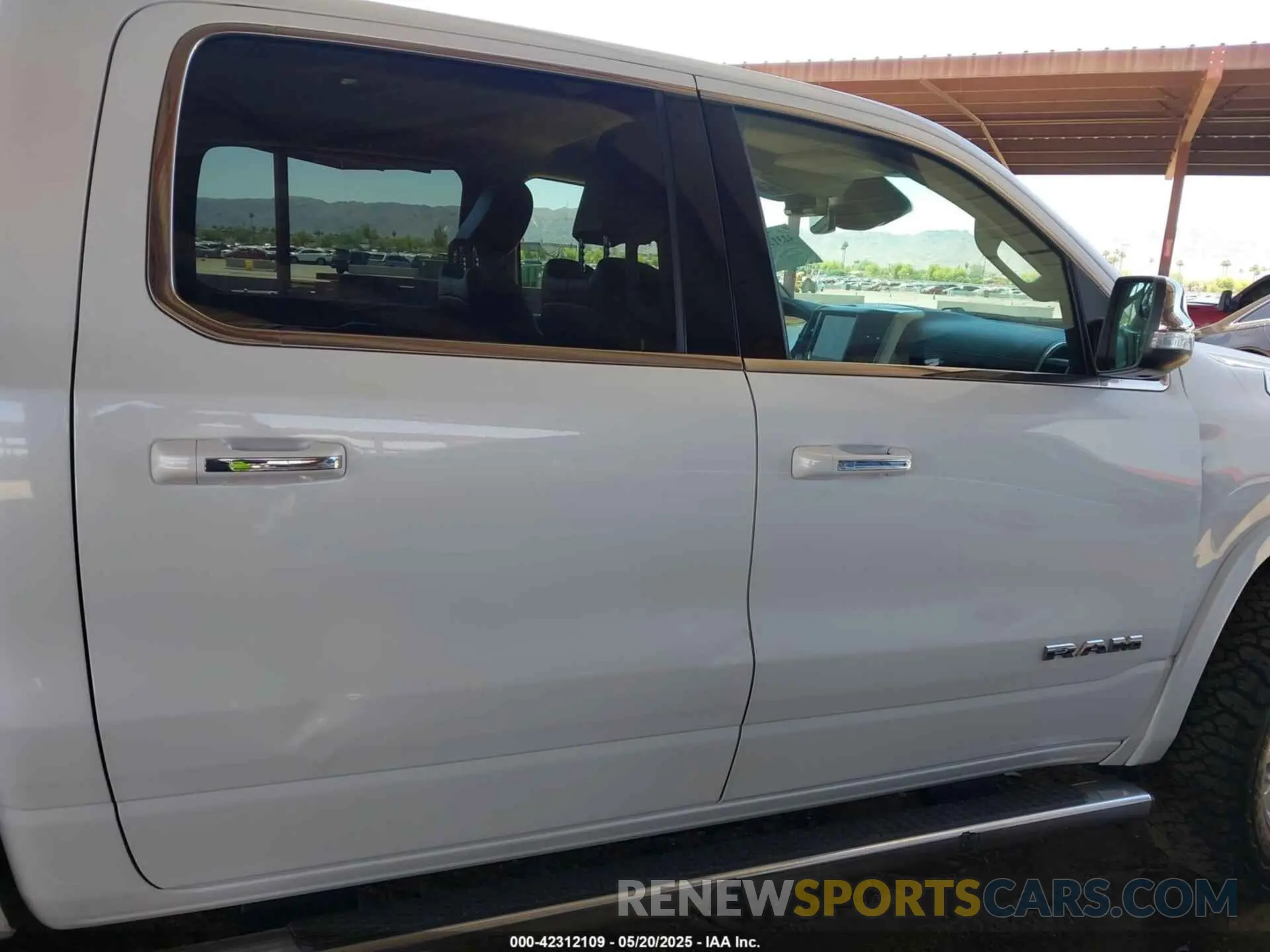 13 Photograph of a damaged car 1C6SRFJT8MN524720 RAM 1500 2021