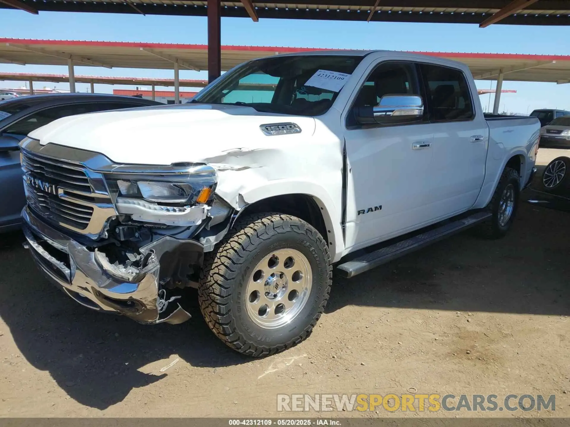 2 Photograph of a damaged car 1C6SRFJT8MN524720 RAM 1500 2021