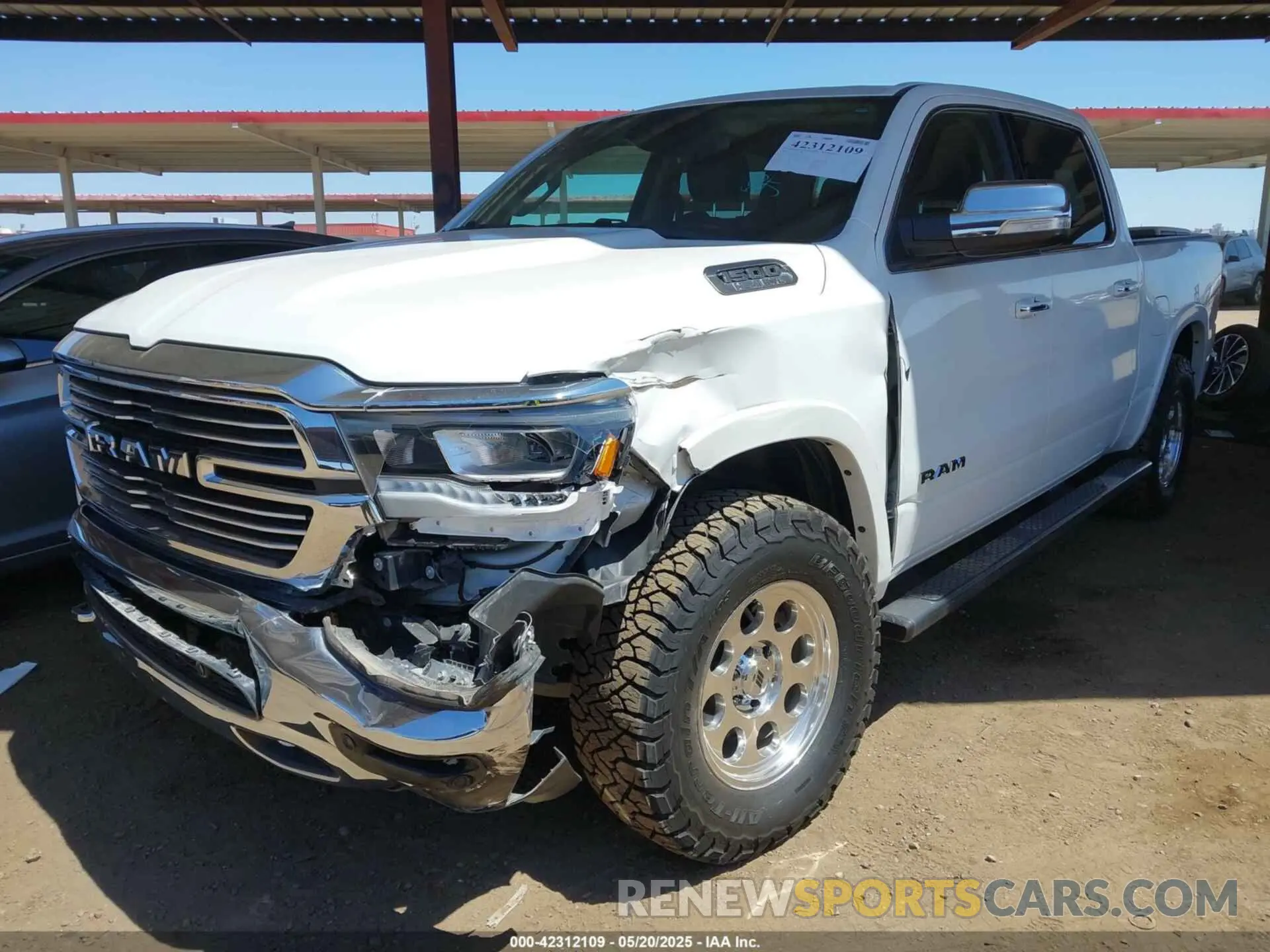 6 Photograph of a damaged car 1C6SRFJT8MN524720 RAM 1500 2021