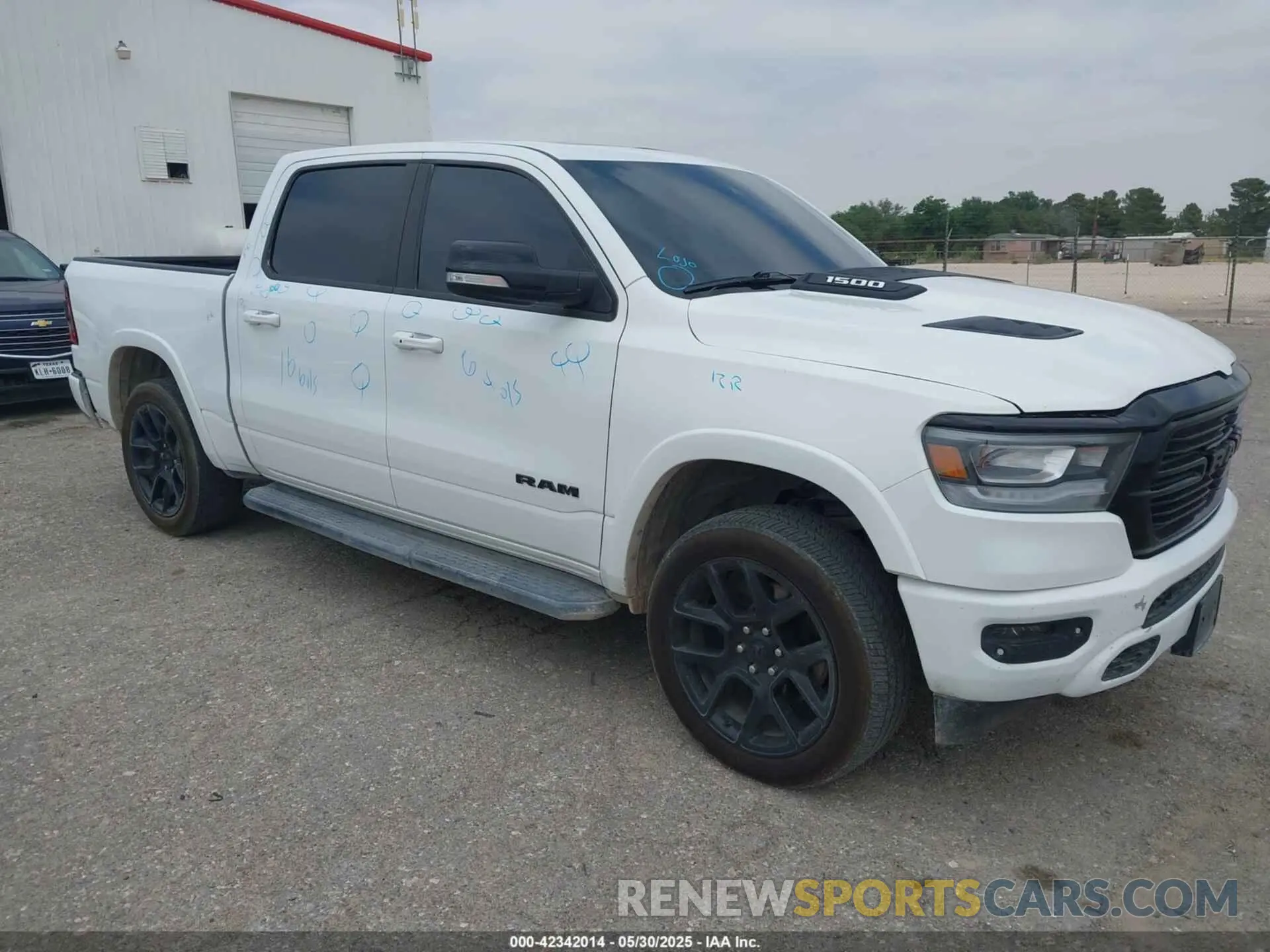 1 Photograph of a damaged car 1C6SRFJT9MN517369 RAM 1500 2021