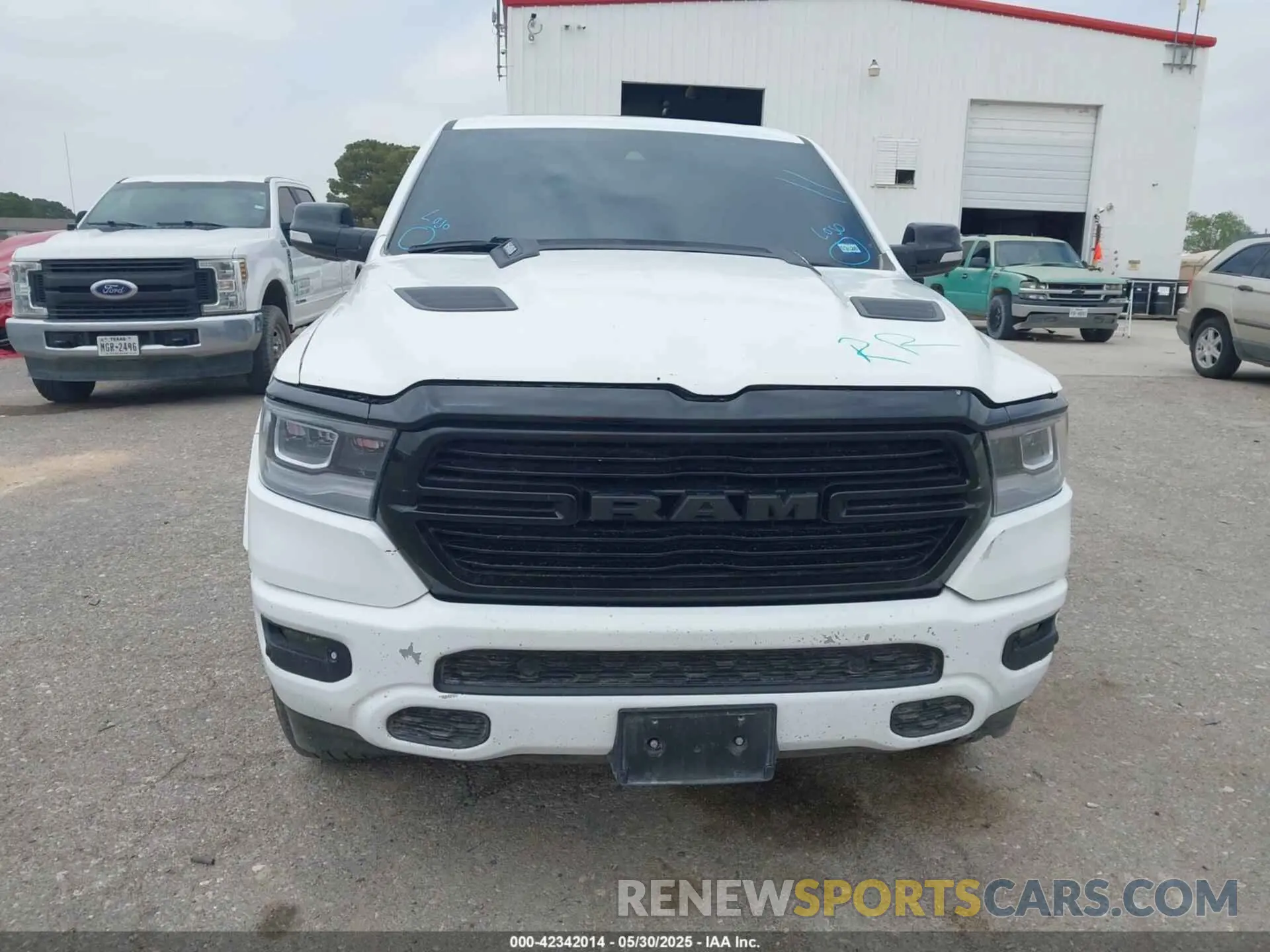 12 Photograph of a damaged car 1C6SRFJT9MN517369 RAM 1500 2021