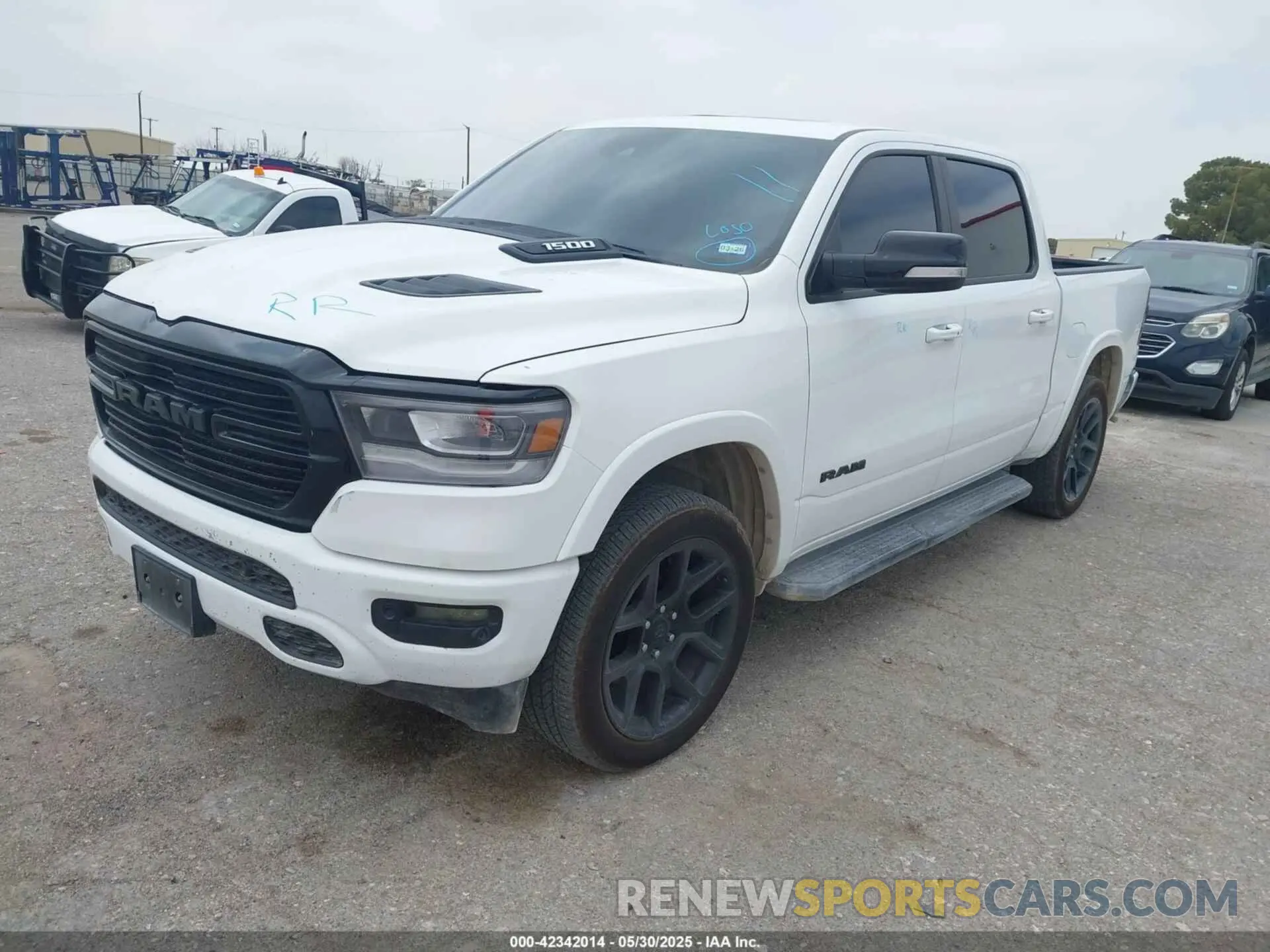 2 Photograph of a damaged car 1C6SRFJT9MN517369 RAM 1500 2021