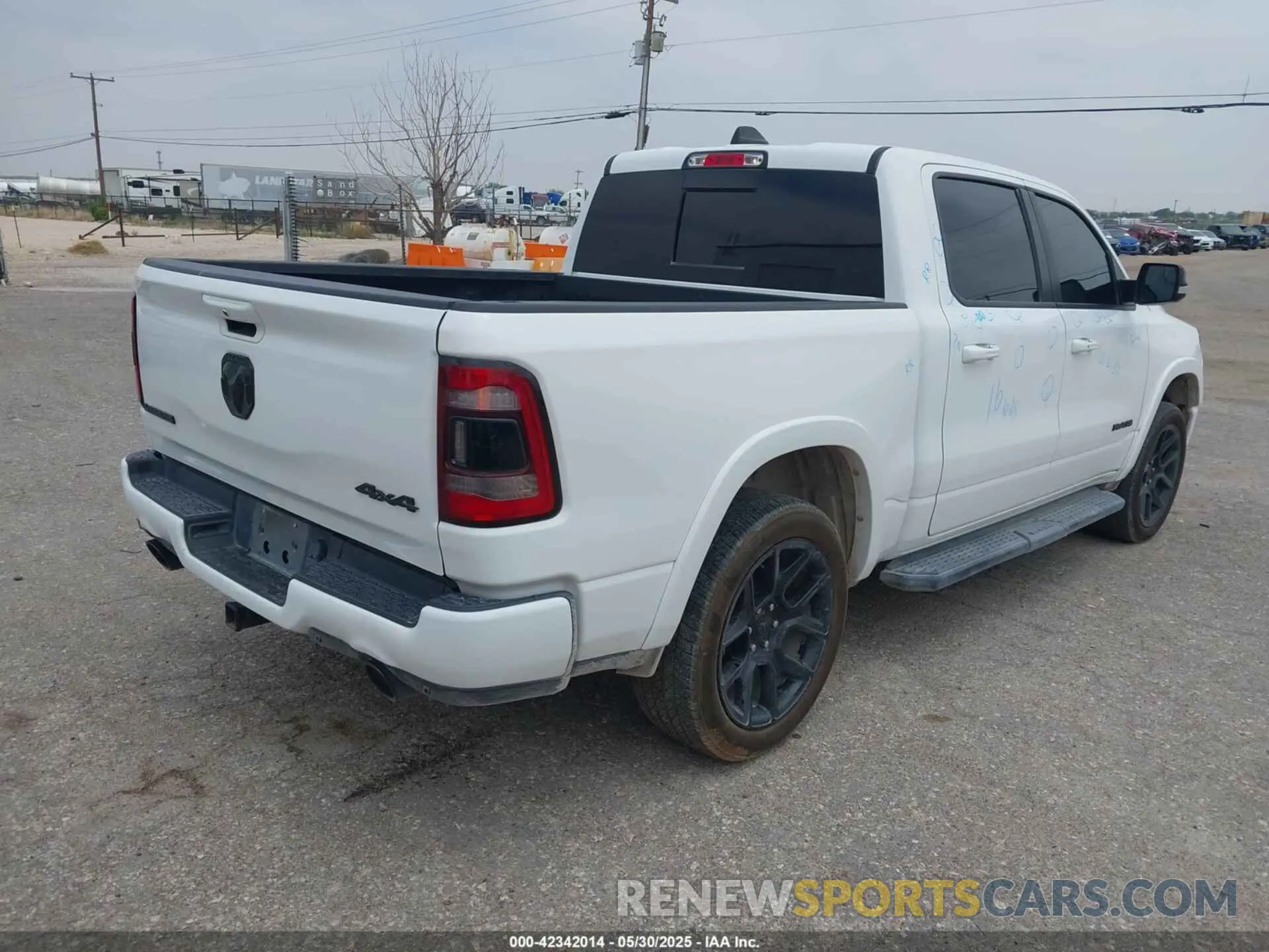 4 Photograph of a damaged car 1C6SRFJT9MN517369 RAM 1500 2021